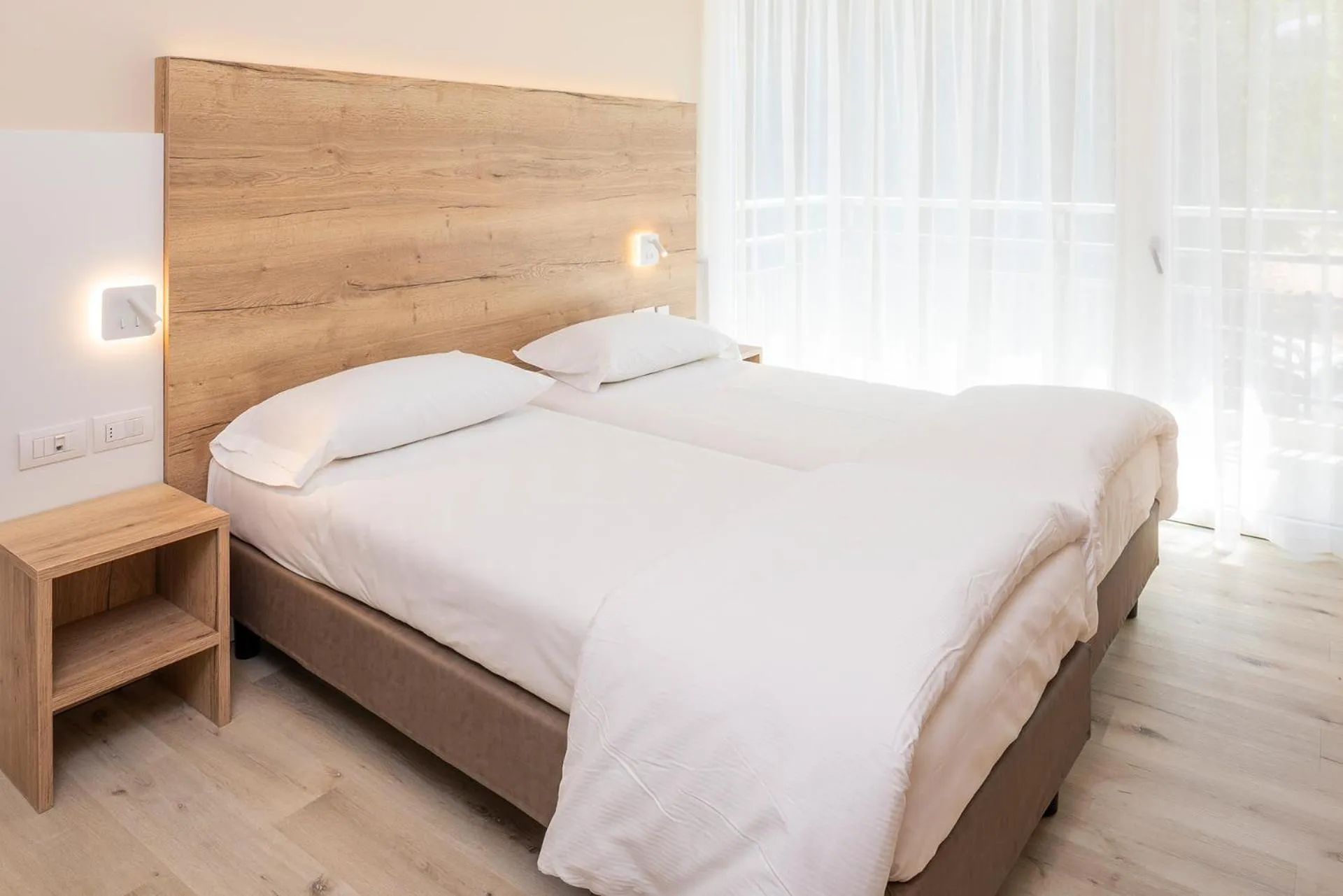 Bedroom in Residence Parco Del Garda