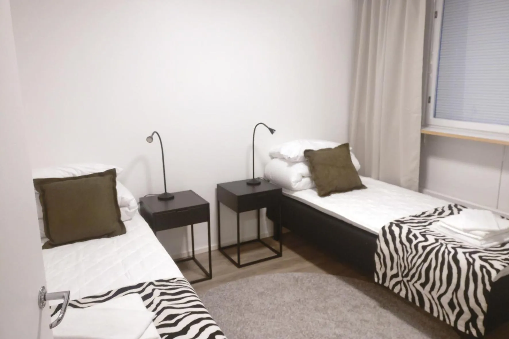 Bed in Kuukkeli Apartments Sodankylä