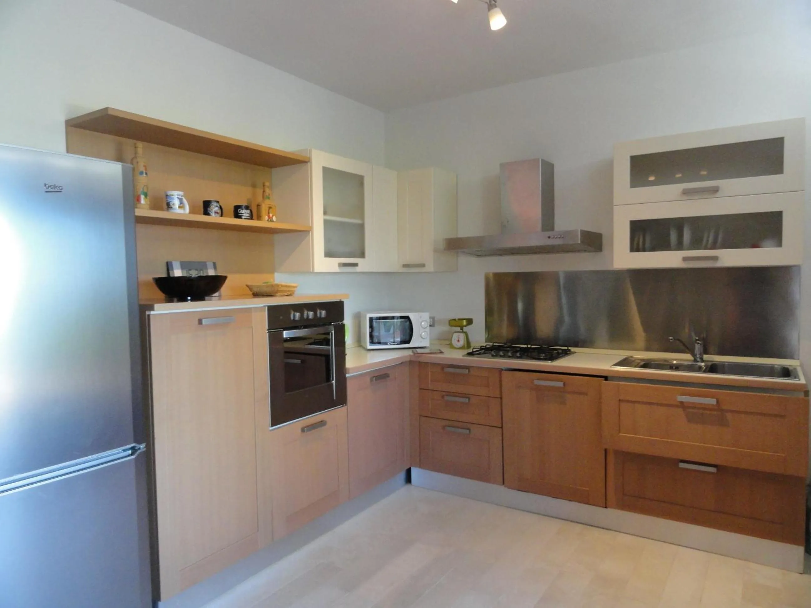 Kitchen or kitchenette in Piccola Baia
