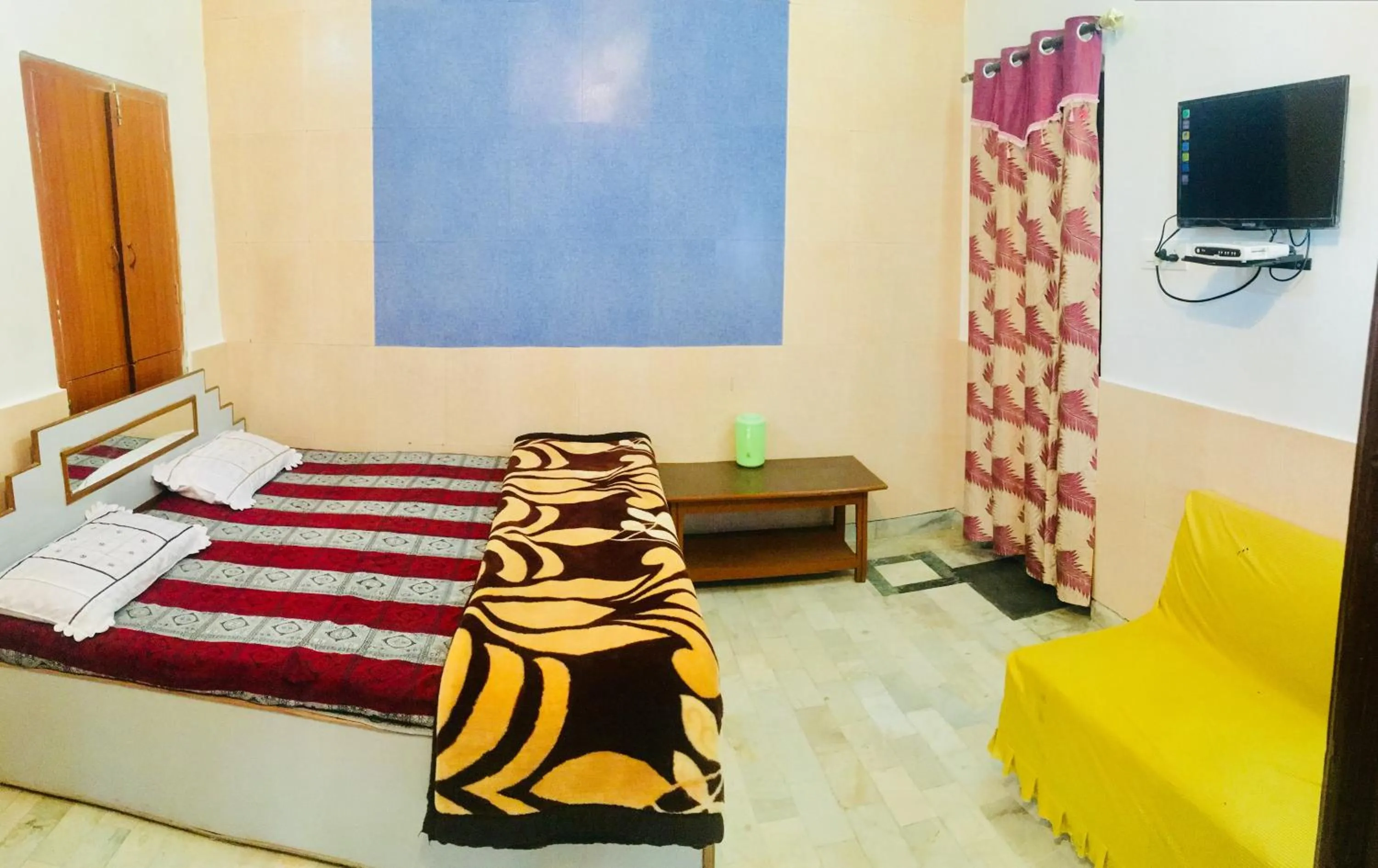 Bed in Hotel Heritage Sanyam