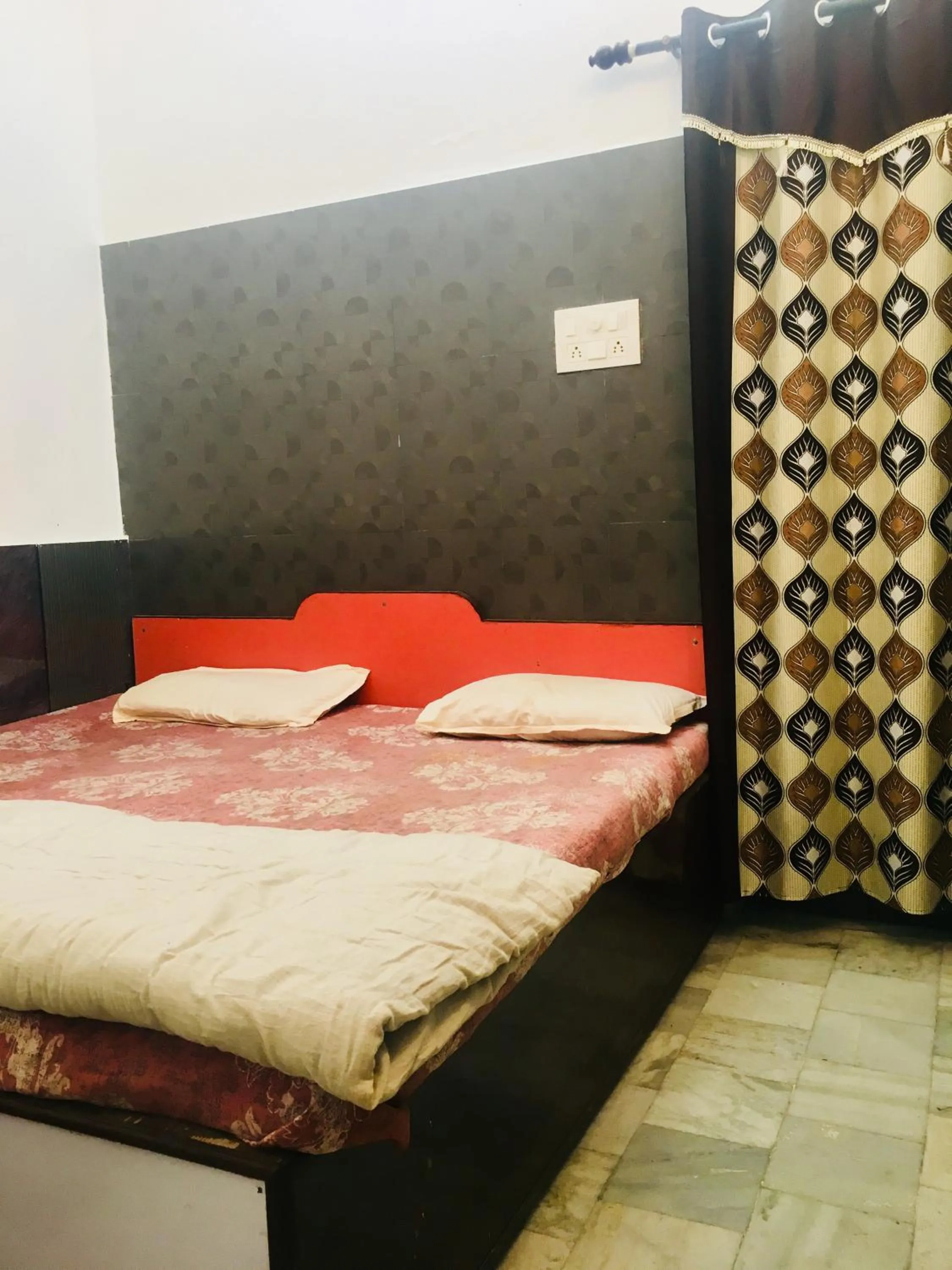 Bed in Hotel Heritage Sanyam