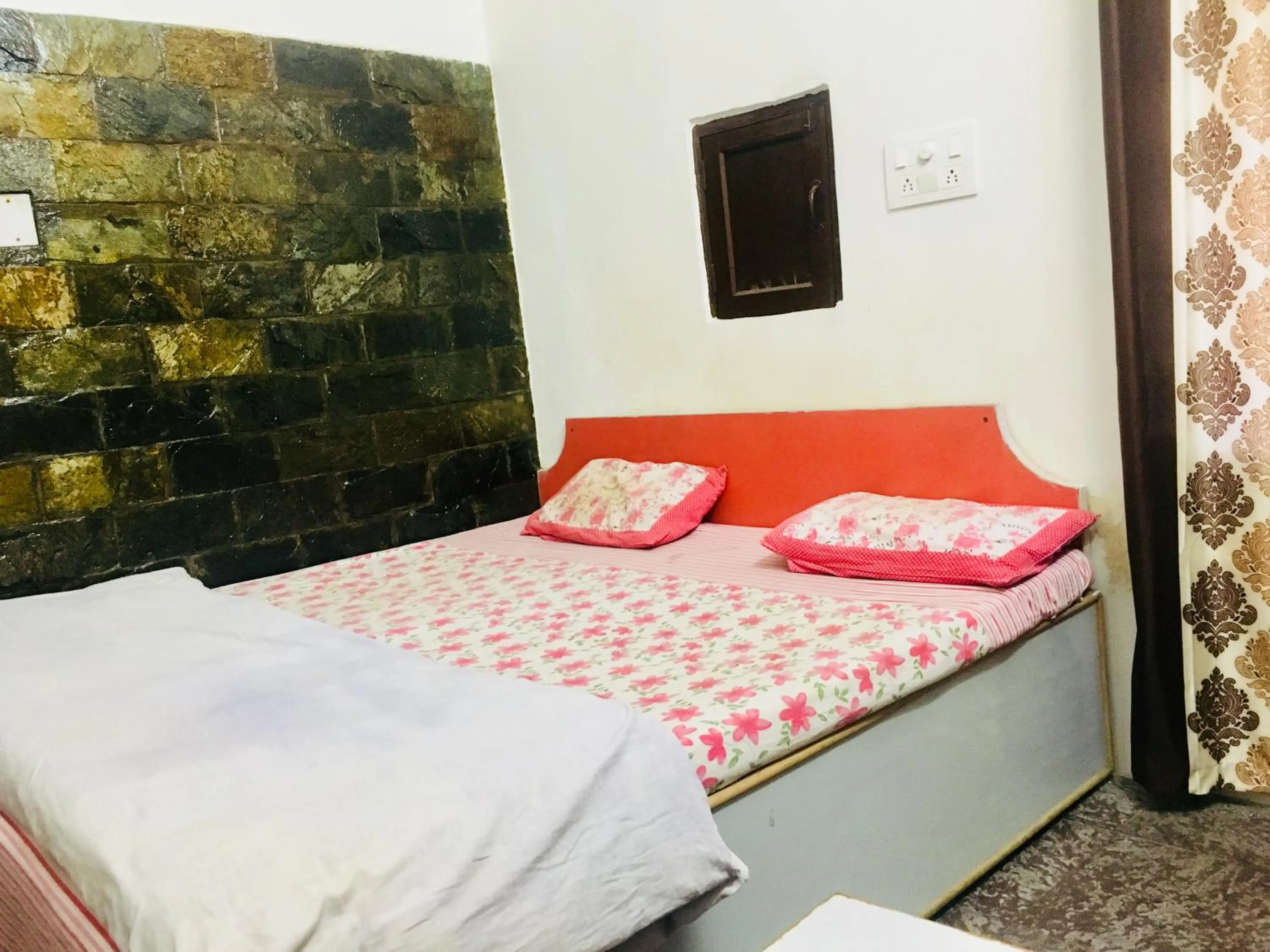 Bed in Hotel Heritage Sanyam