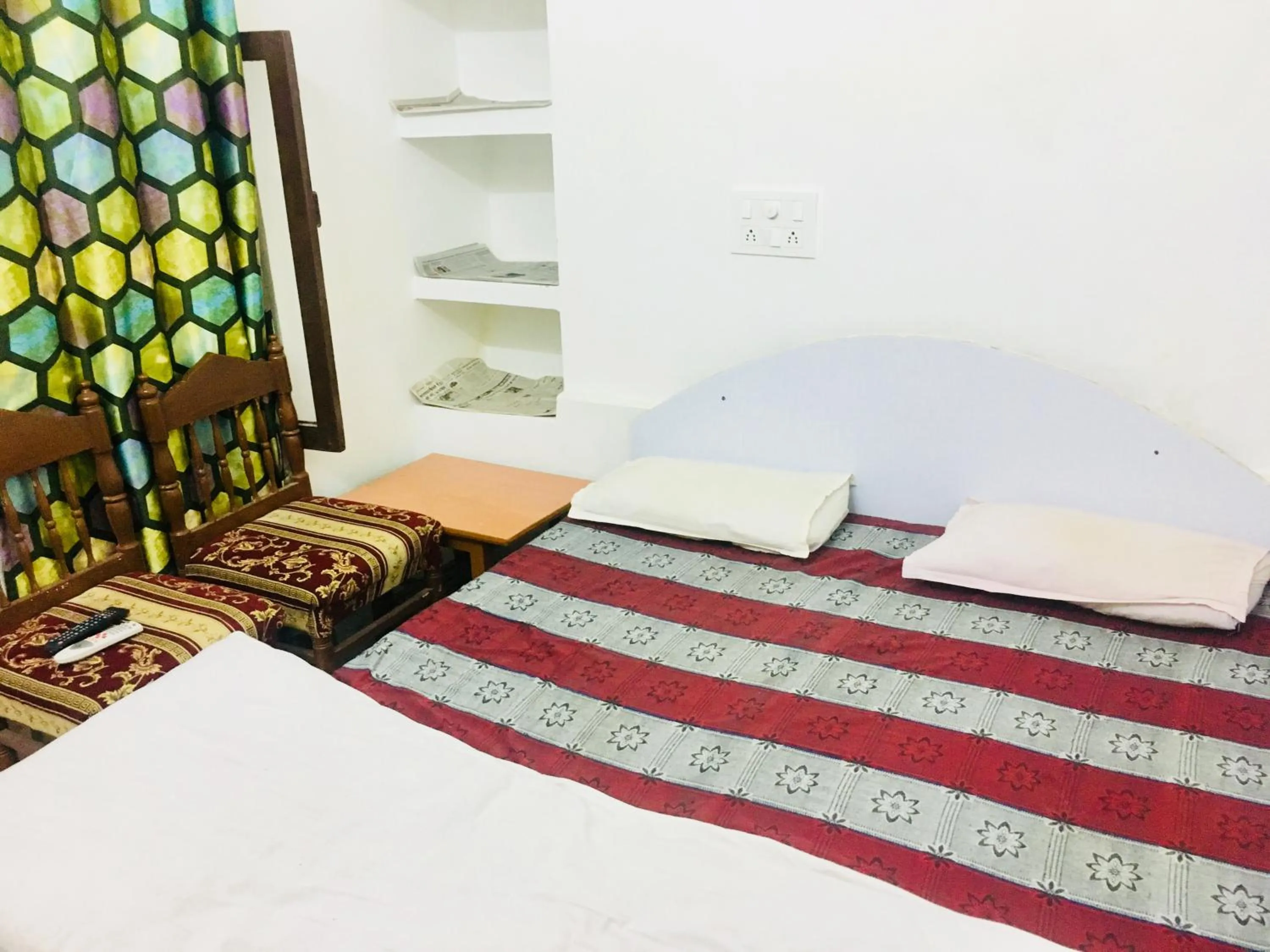 Bed in Hotel Heritage Sanyam