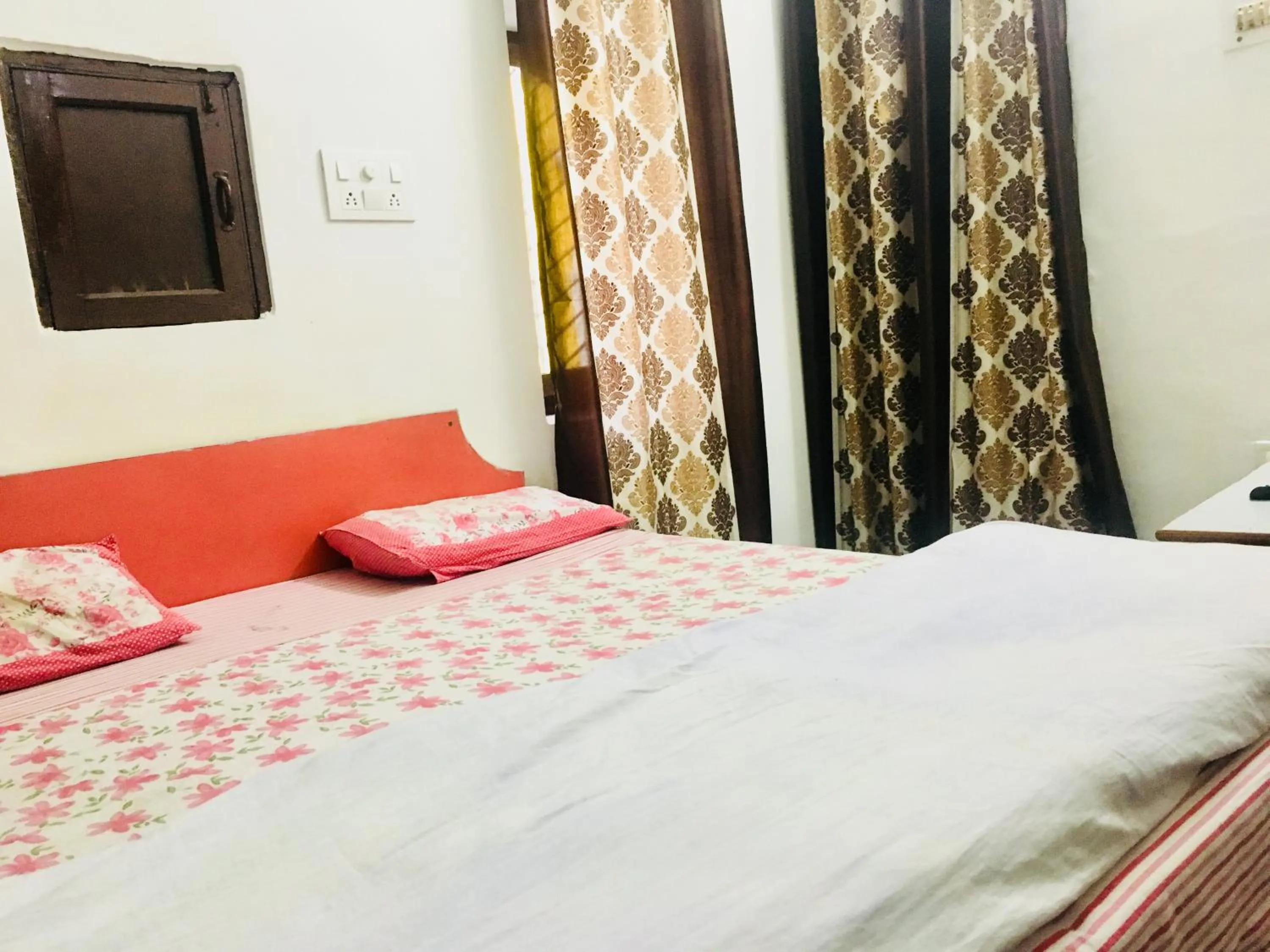 Bed in Hotel Heritage Sanyam