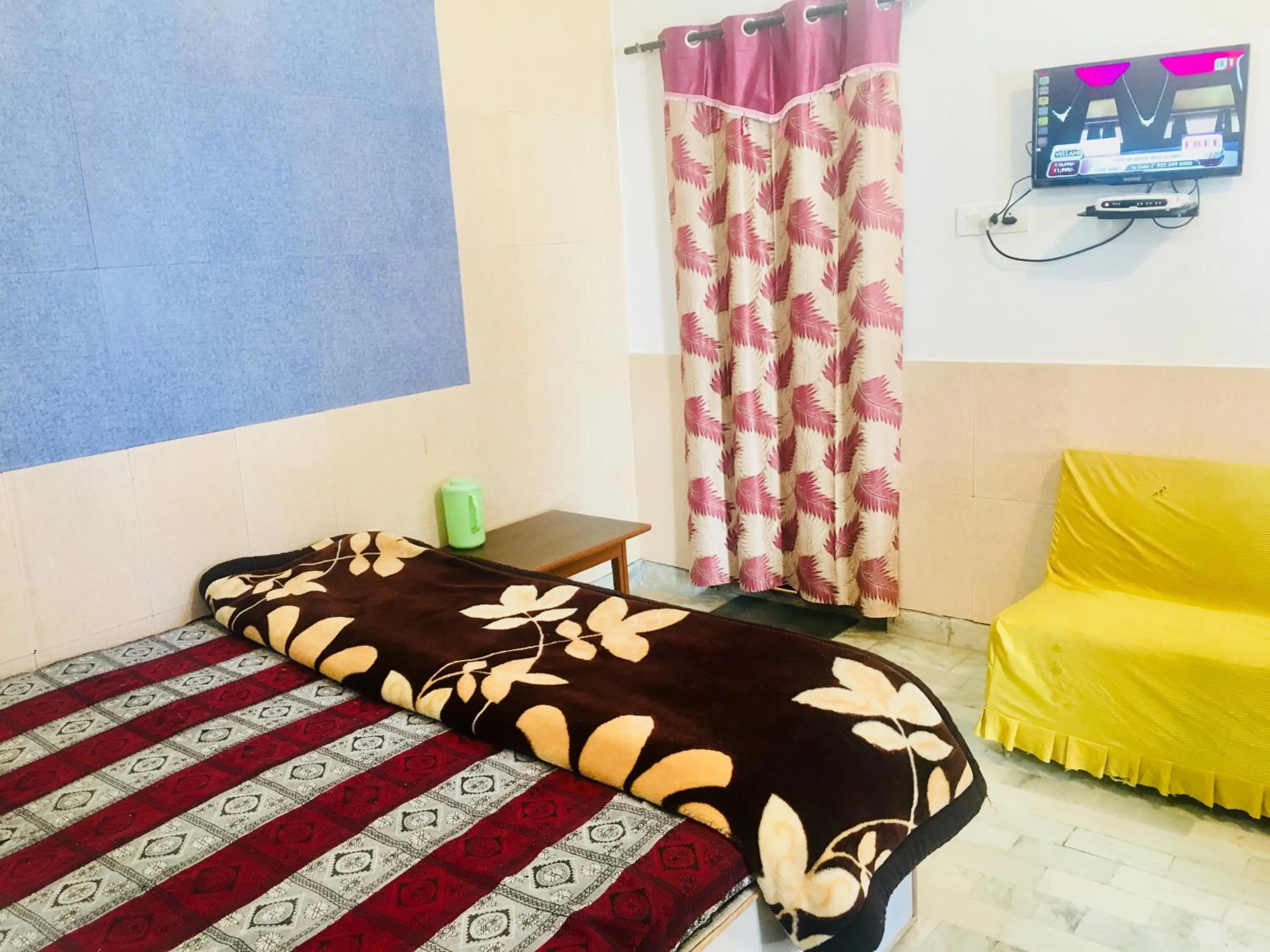 Bed in Hotel Heritage Sanyam