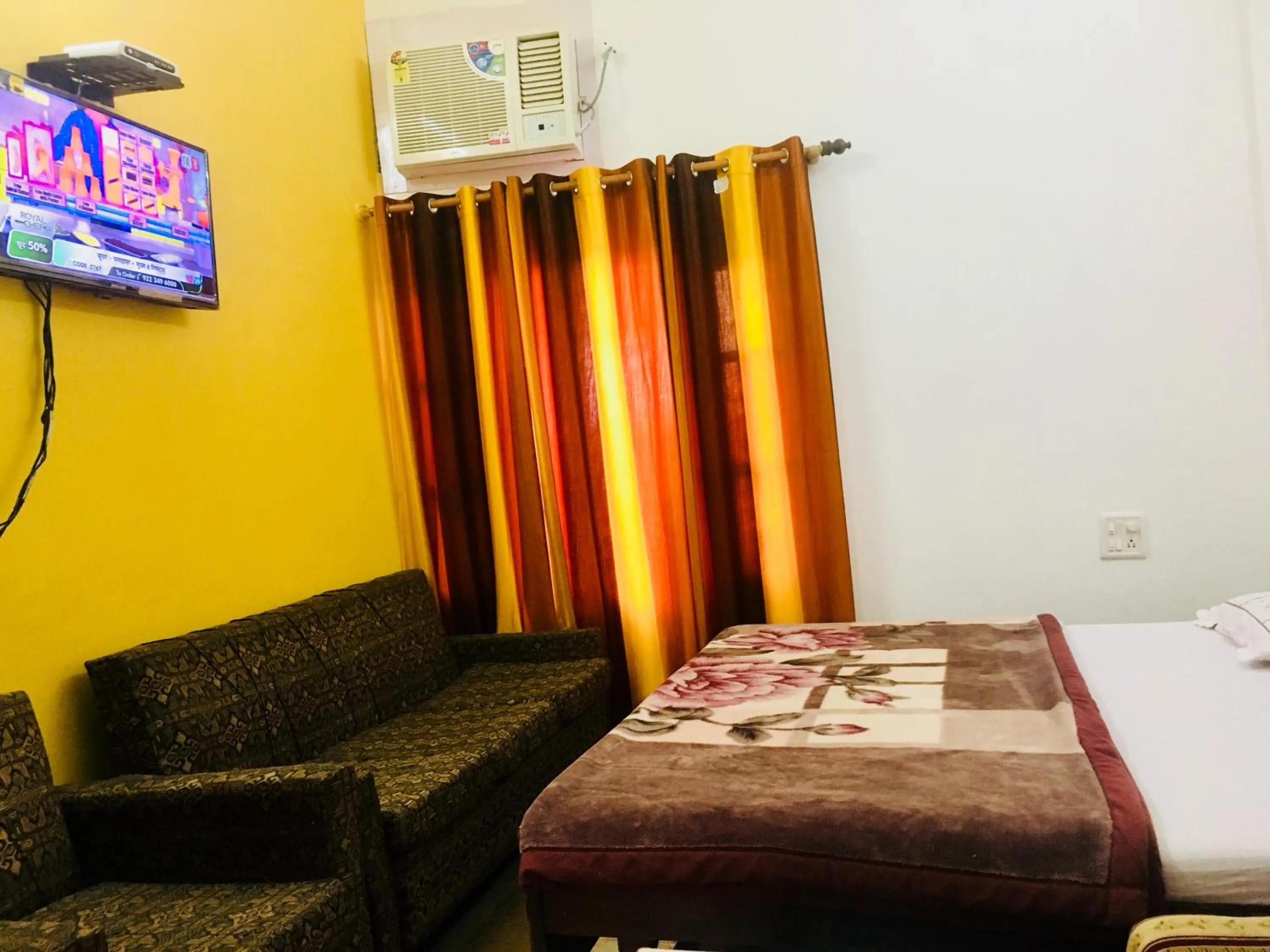 Bed in Hotel Heritage Sanyam