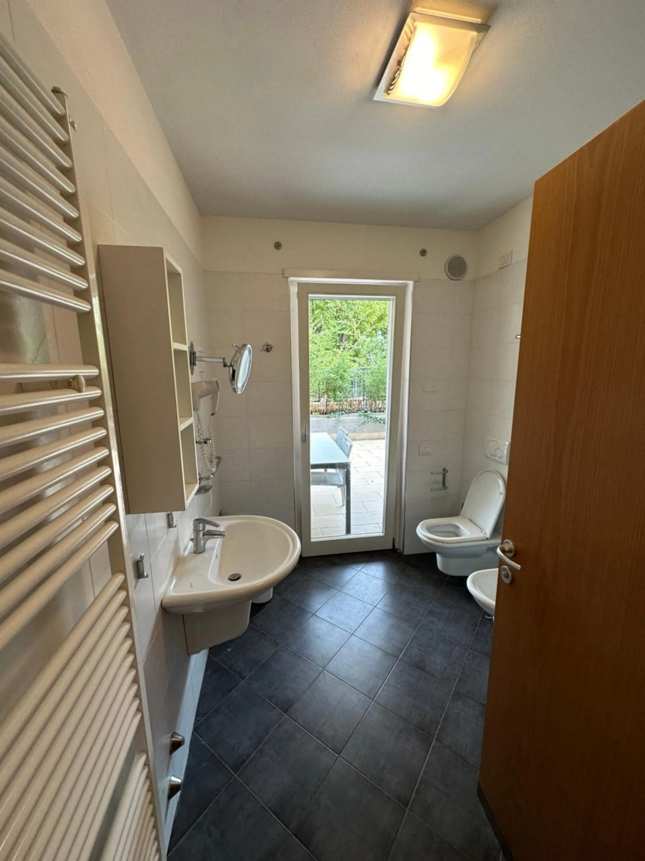 Toilet in 4 Limoni Apartment Resort