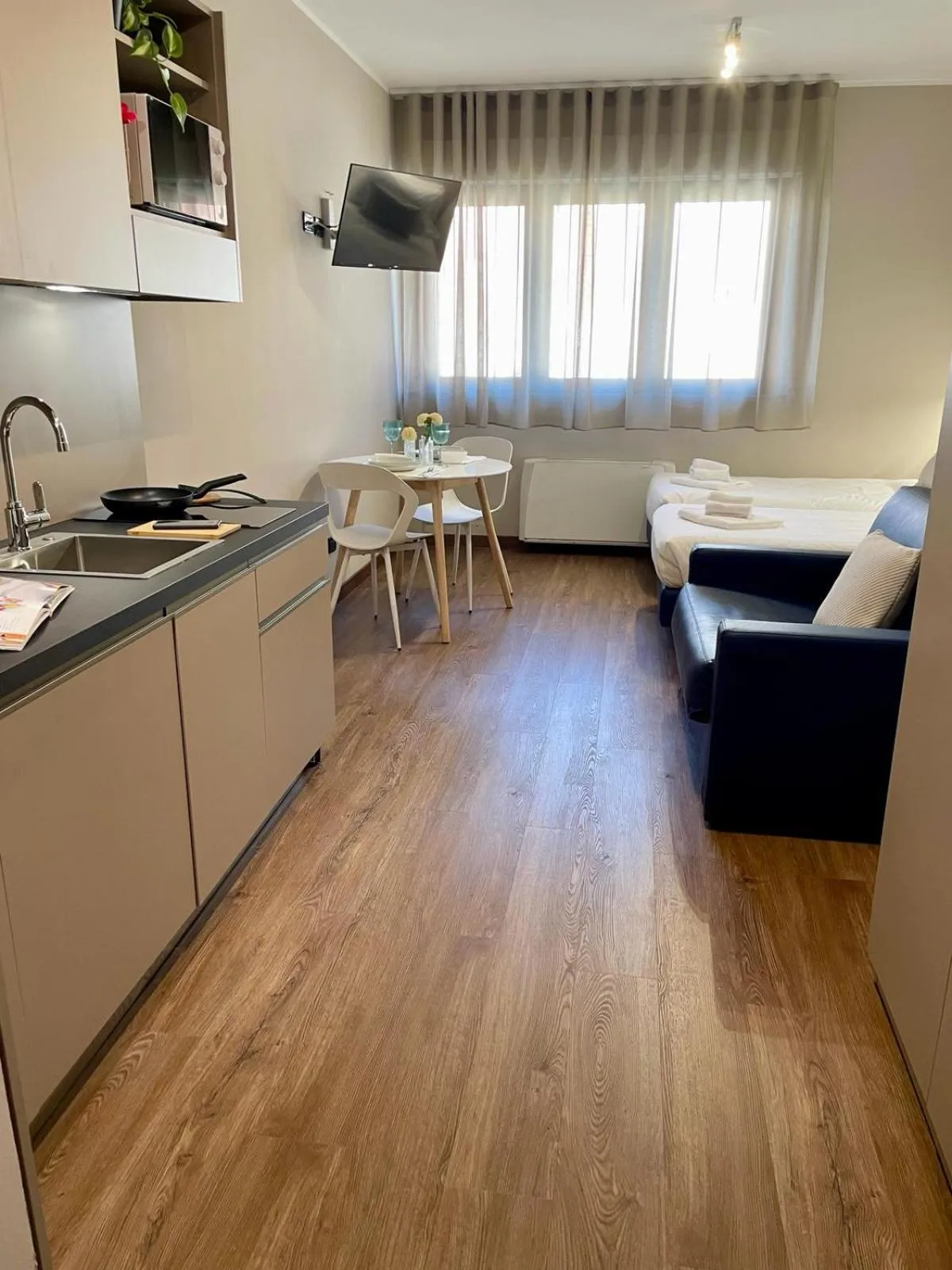 Photo of the whole room in Bnbook Expo Residence Rho