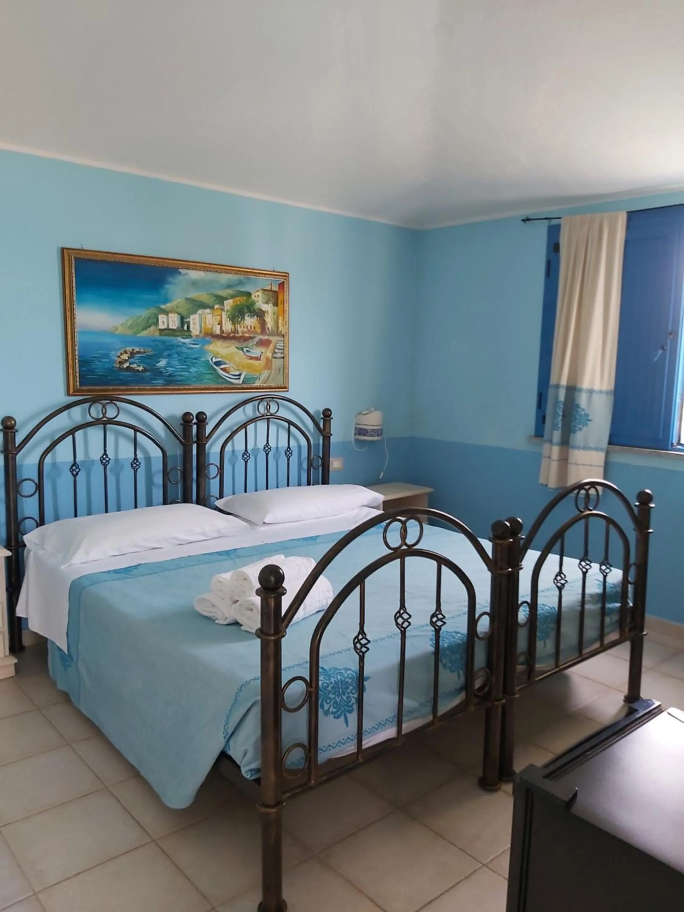 Photo of the whole room, Bed in Hotel Baia Cea