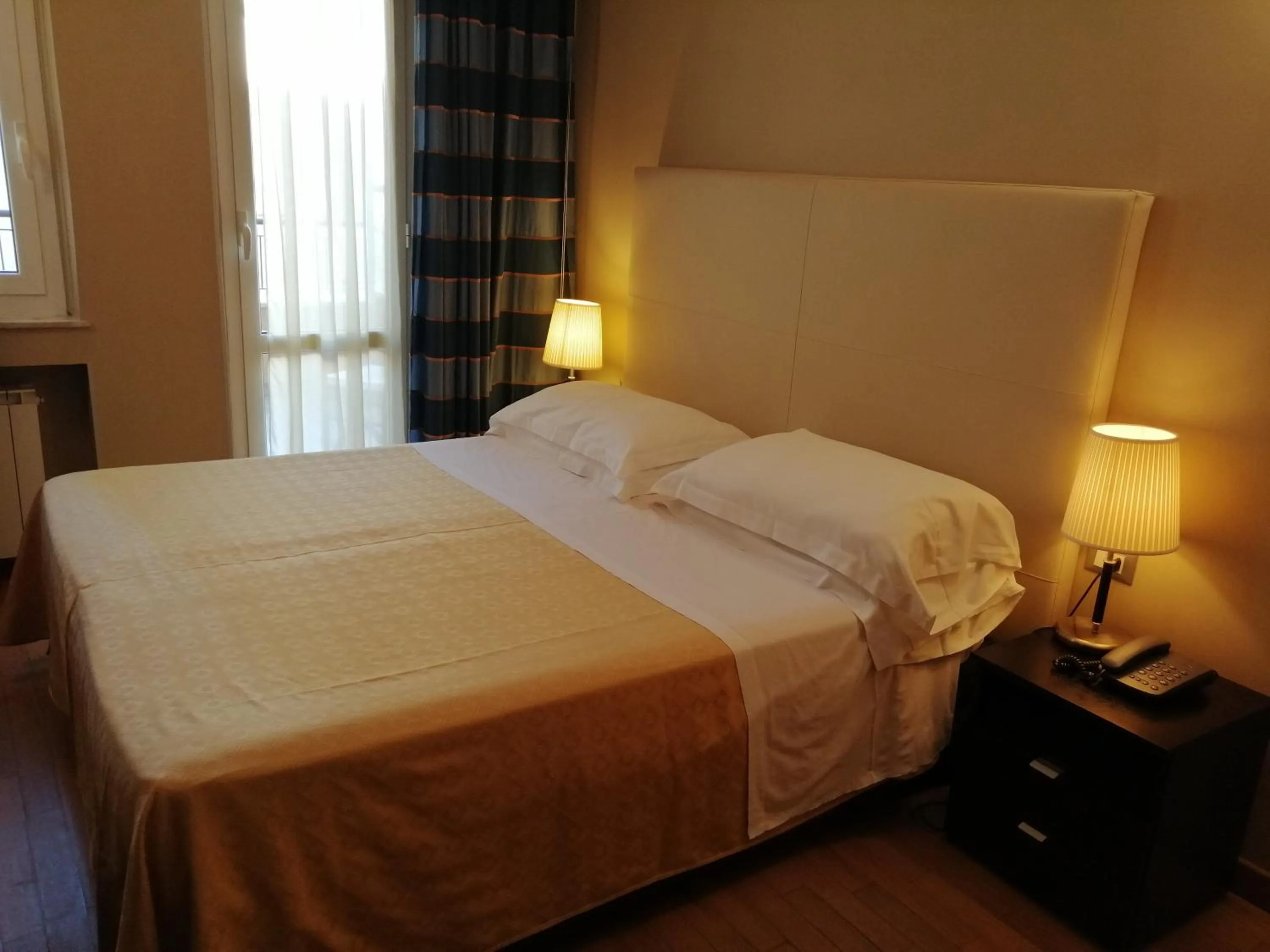 Bed in Hotel Corso Alaxi Hotels