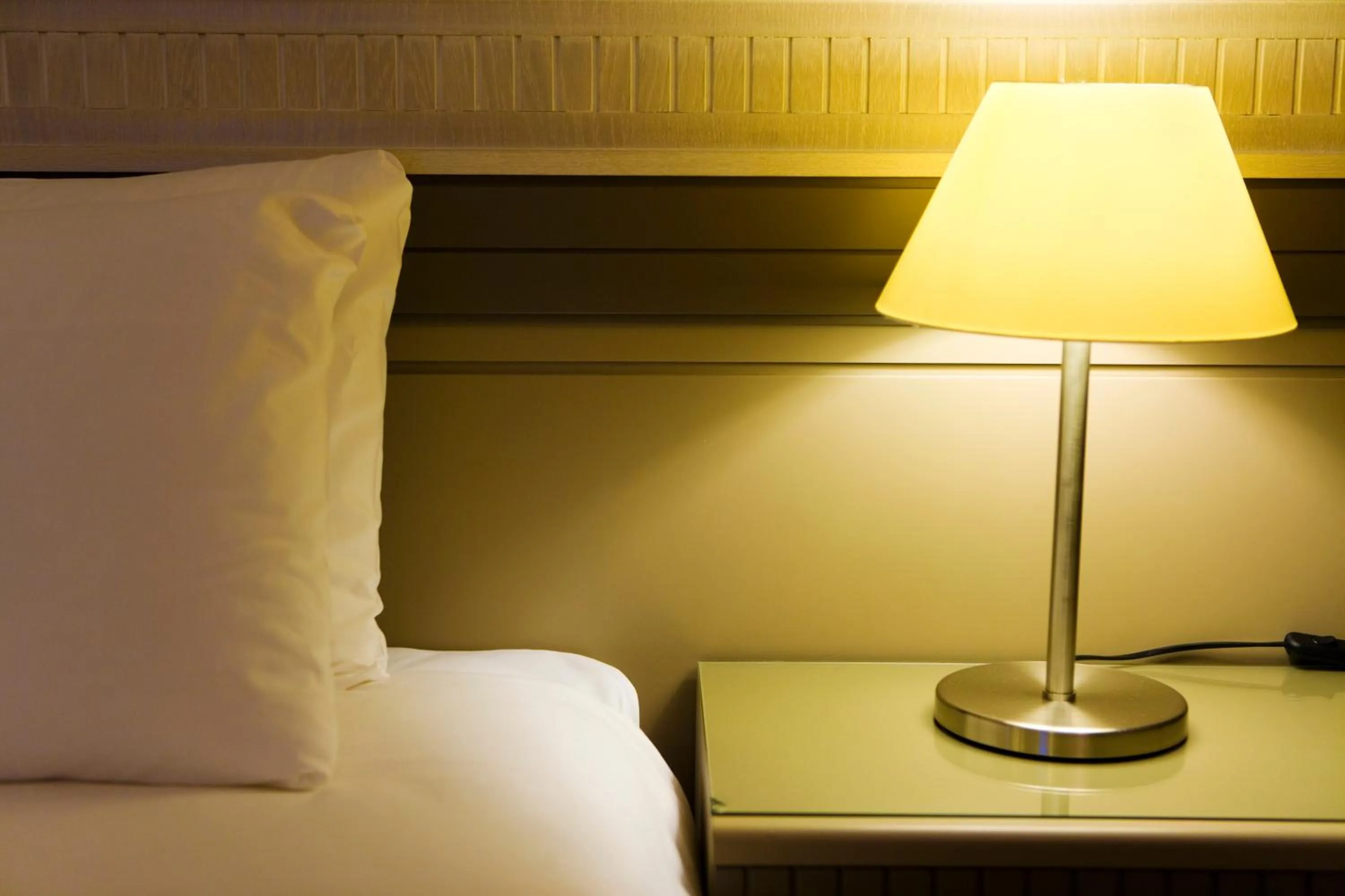 Bed in Fantasia Deluxe Hotel