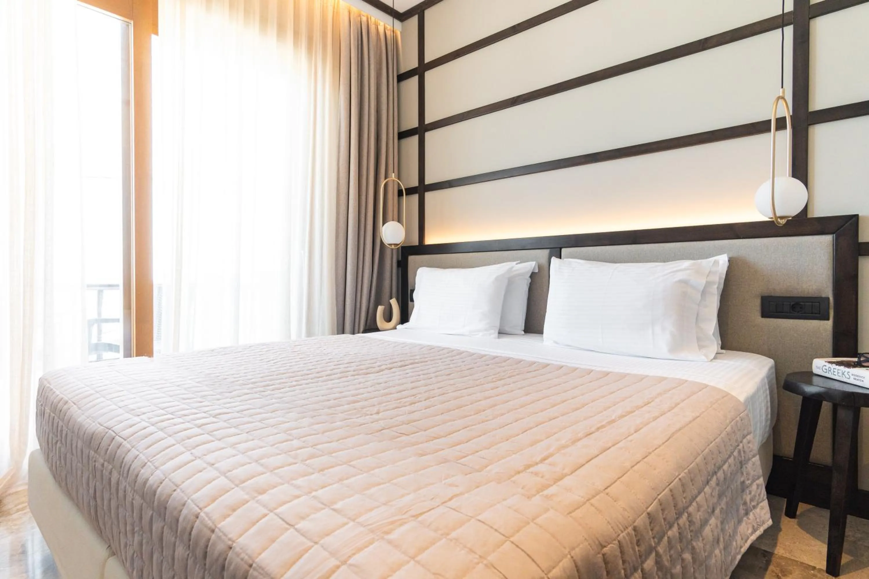 Bed in Sunrise Hotel