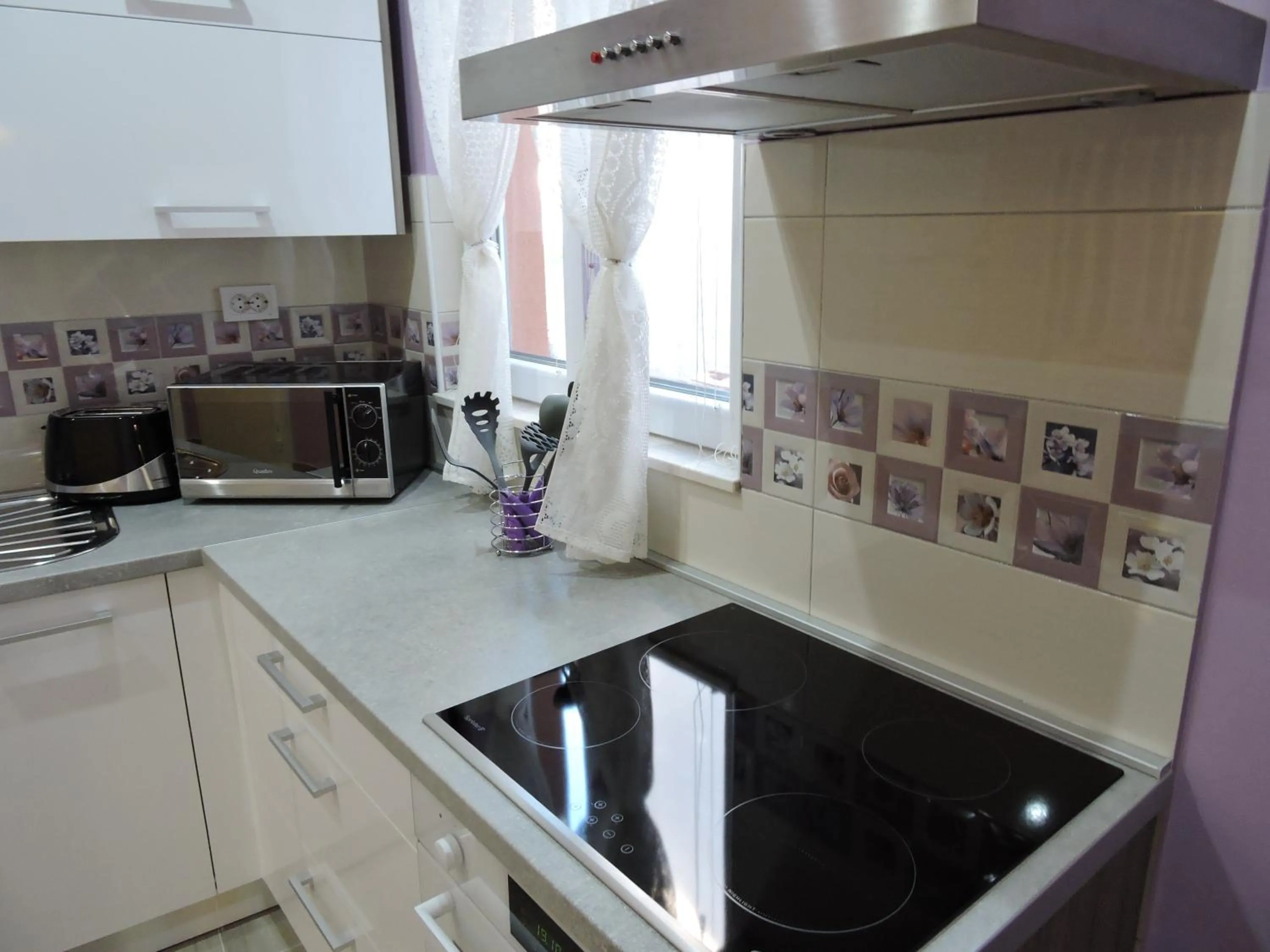 Kitchen or kitchenette in Apartments Perla