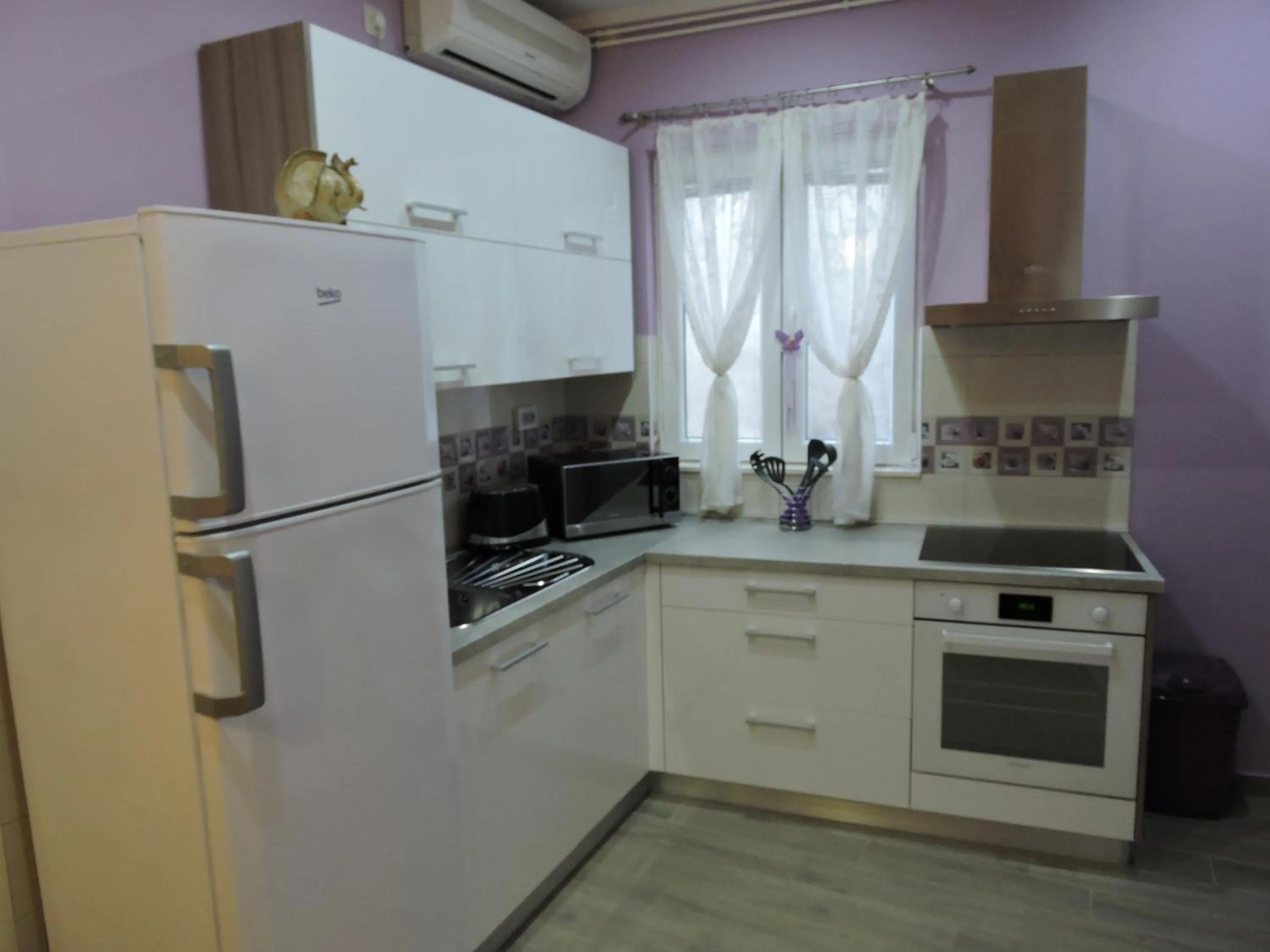 Kitchen or kitchenette in Apartments Perla