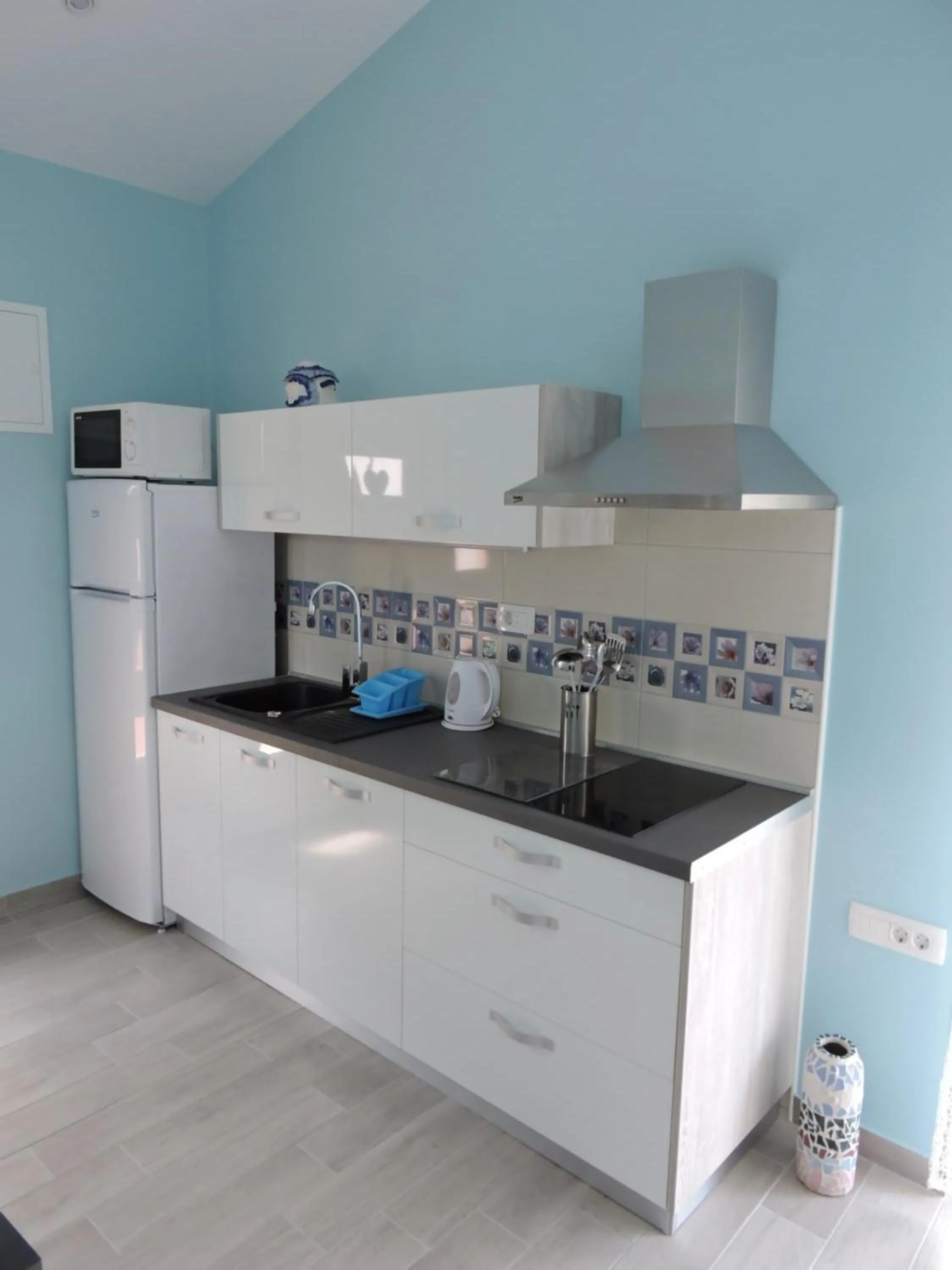 Kitchen or kitchenette in Apartments Perla