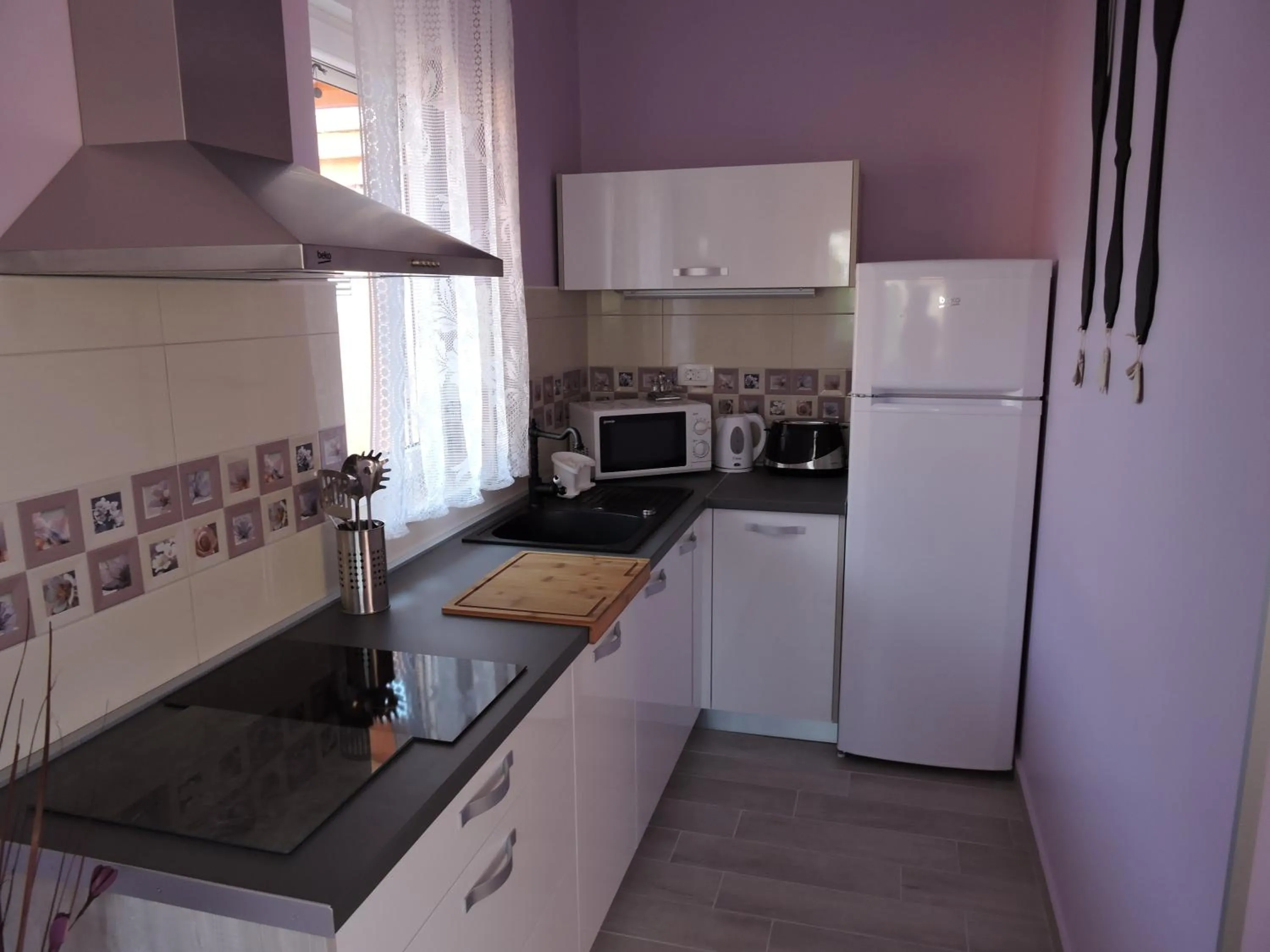 Kitchen or kitchenette in Apartments Perla