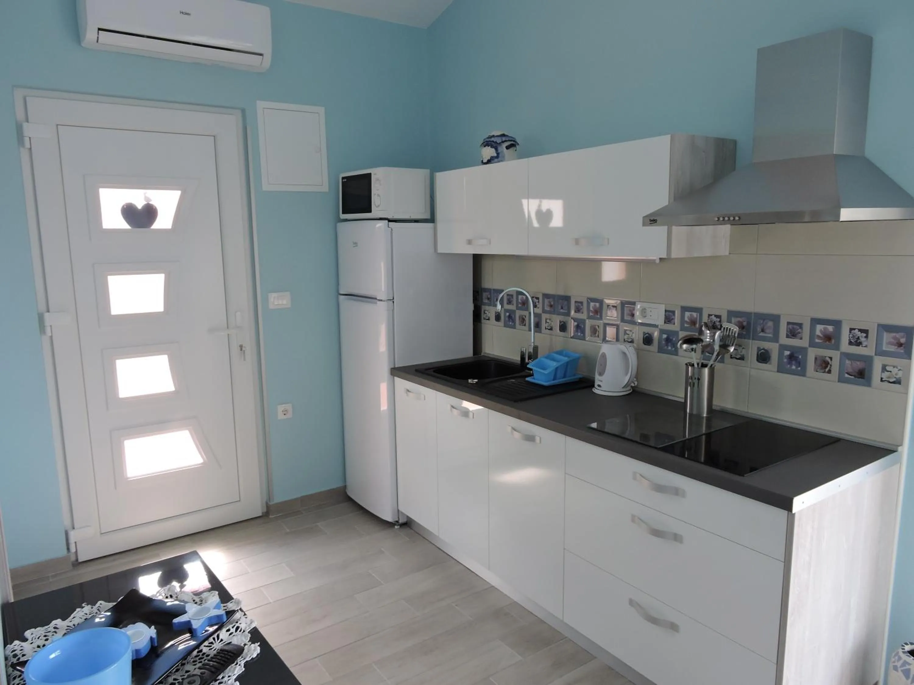 Kitchen or kitchenette in Apartments Perla