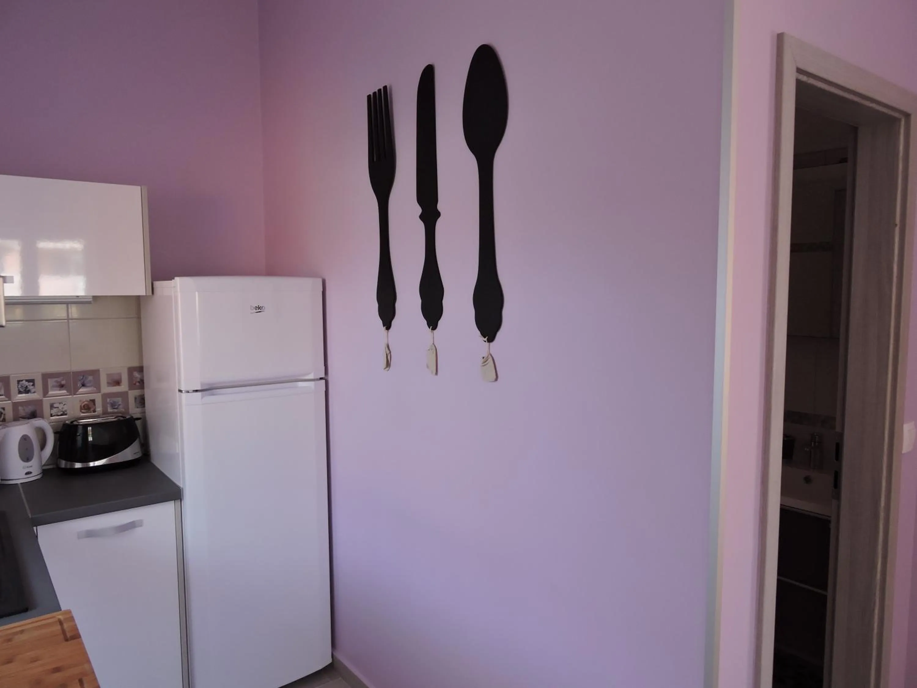 Kitchen or kitchenette in Apartments Perla