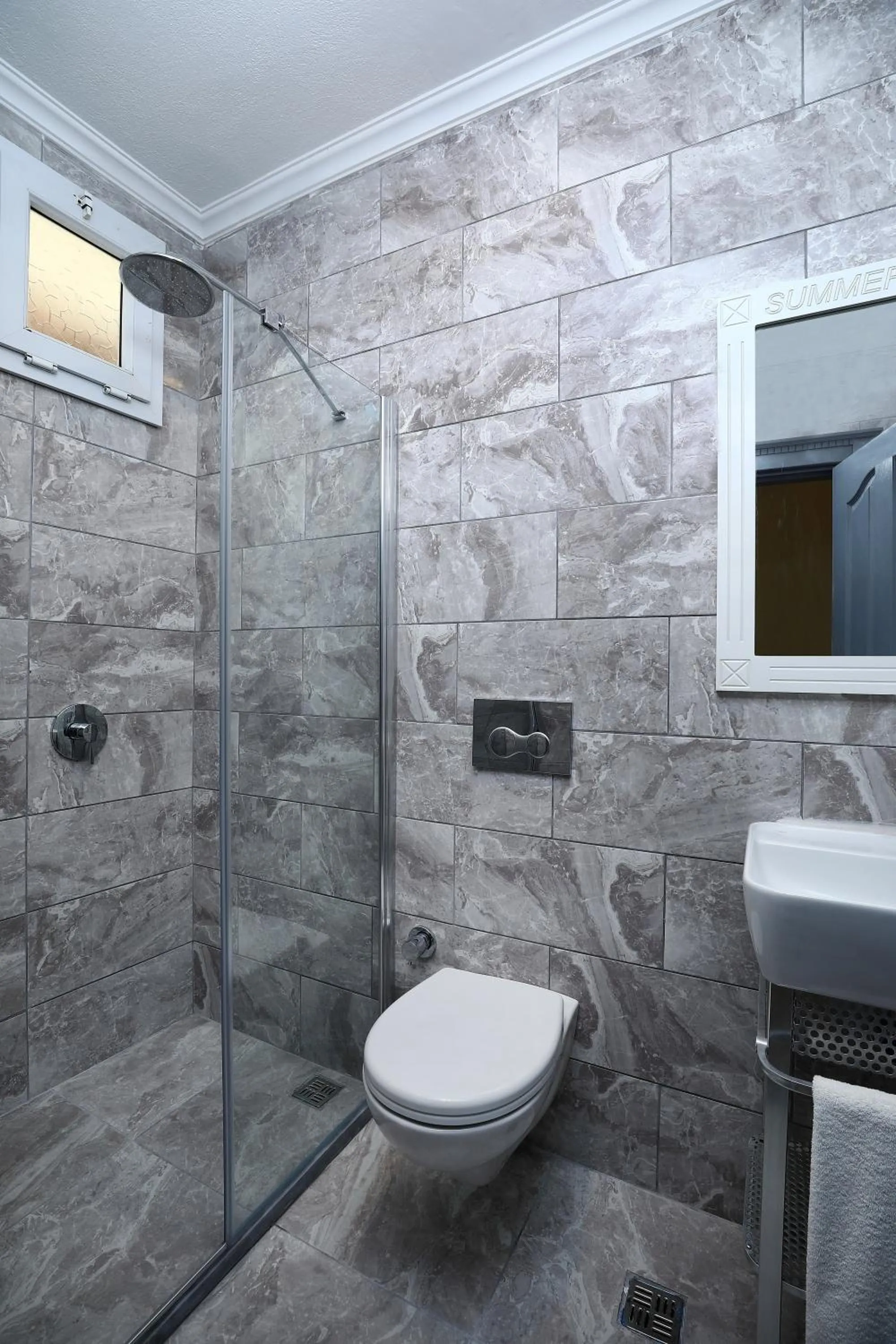 Shower in Summer Garden Suites Beach Hotel