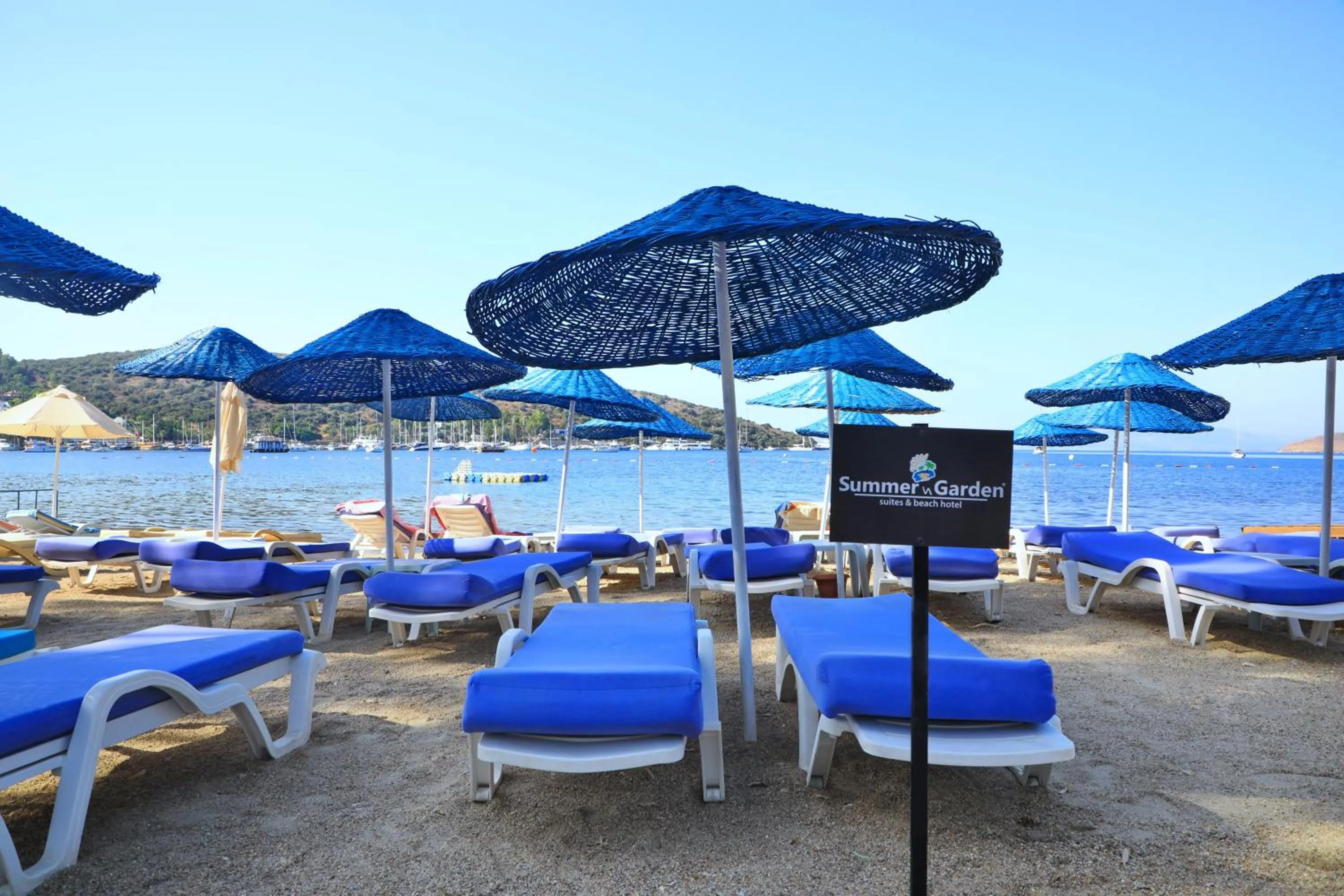 Beach in Summer Garden Suites Beach Hotel