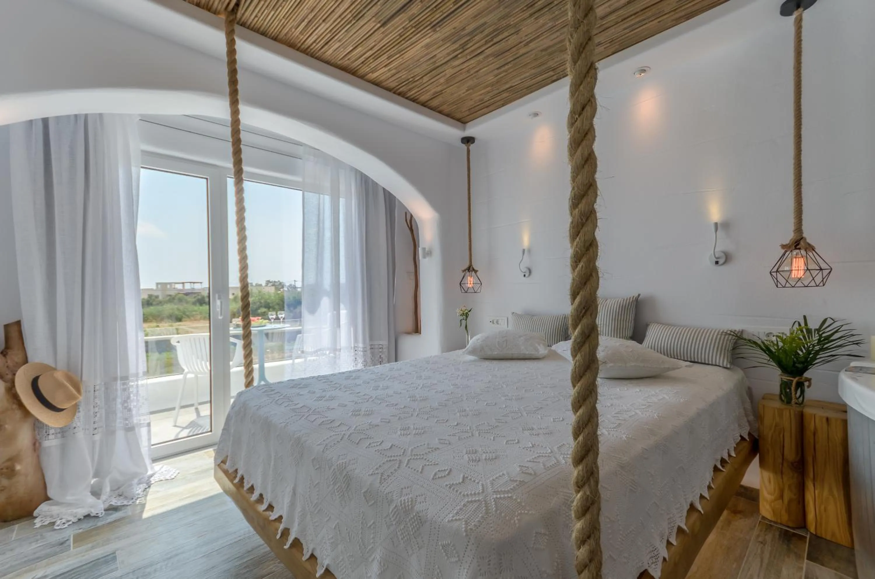 Bed in Naxos Island Escape Suites