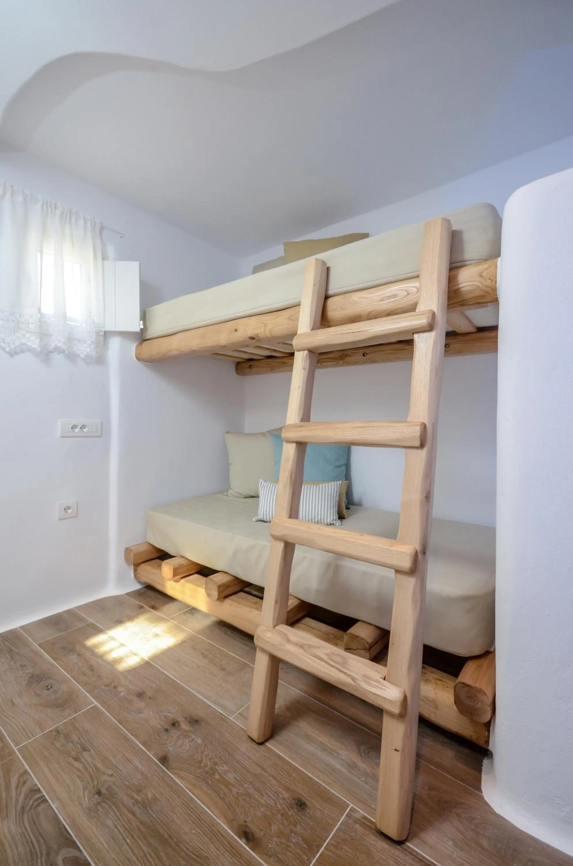 Bed in Naxos Island Escape Suites
