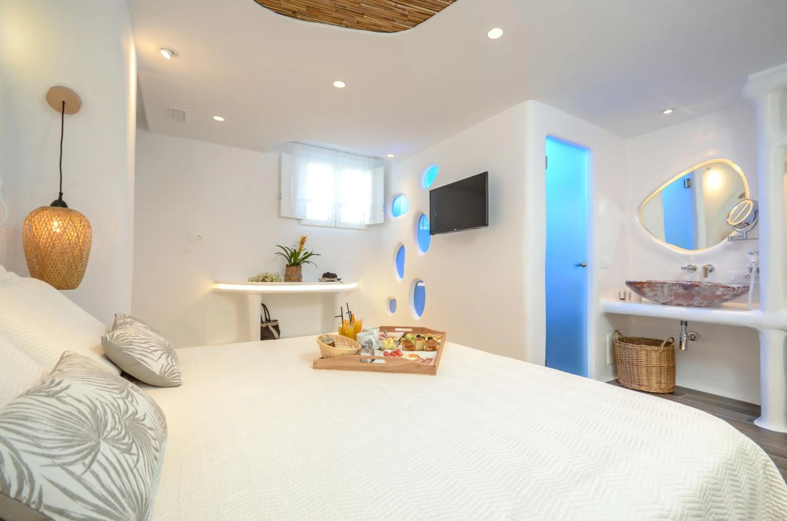 Bed in Naxos Island Escape Suites