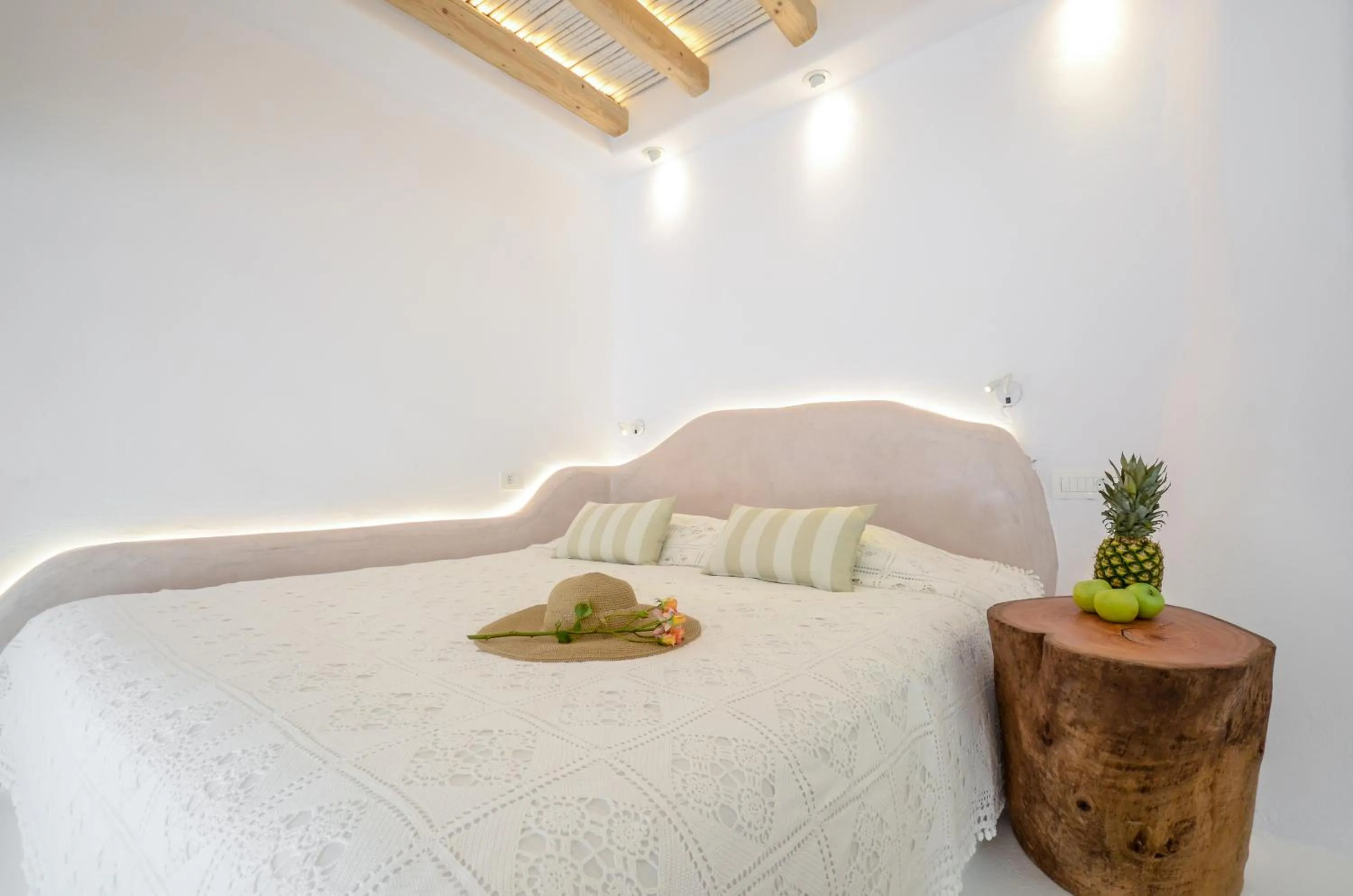 Bed in Naxos Island Escape Suites
