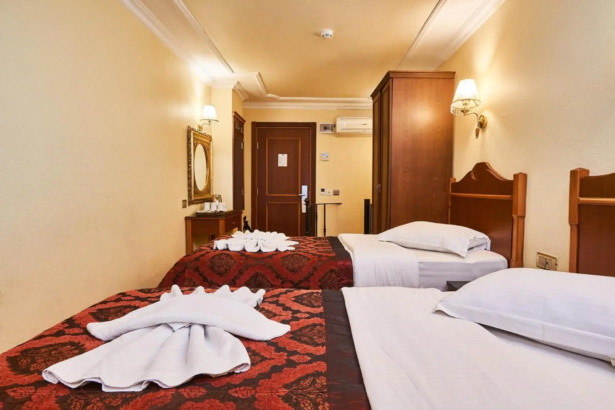 Bed in Amber Hotel & Spa Bed in Amber Hotel & Spa