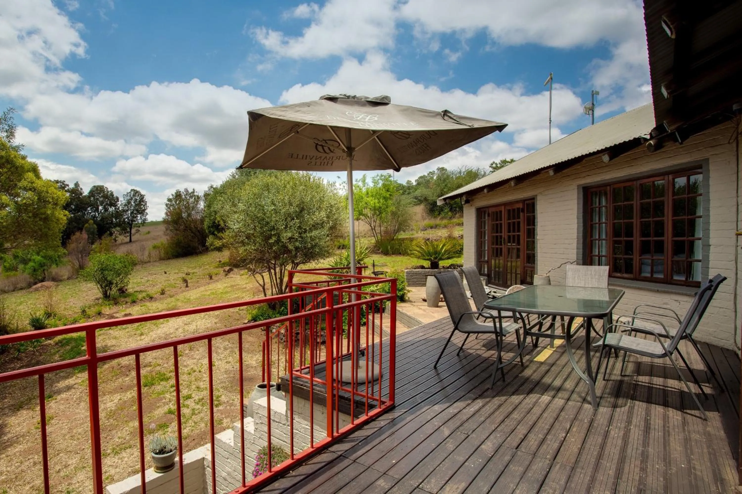 Balcony/Terrace in Whispering Pines Country Estate