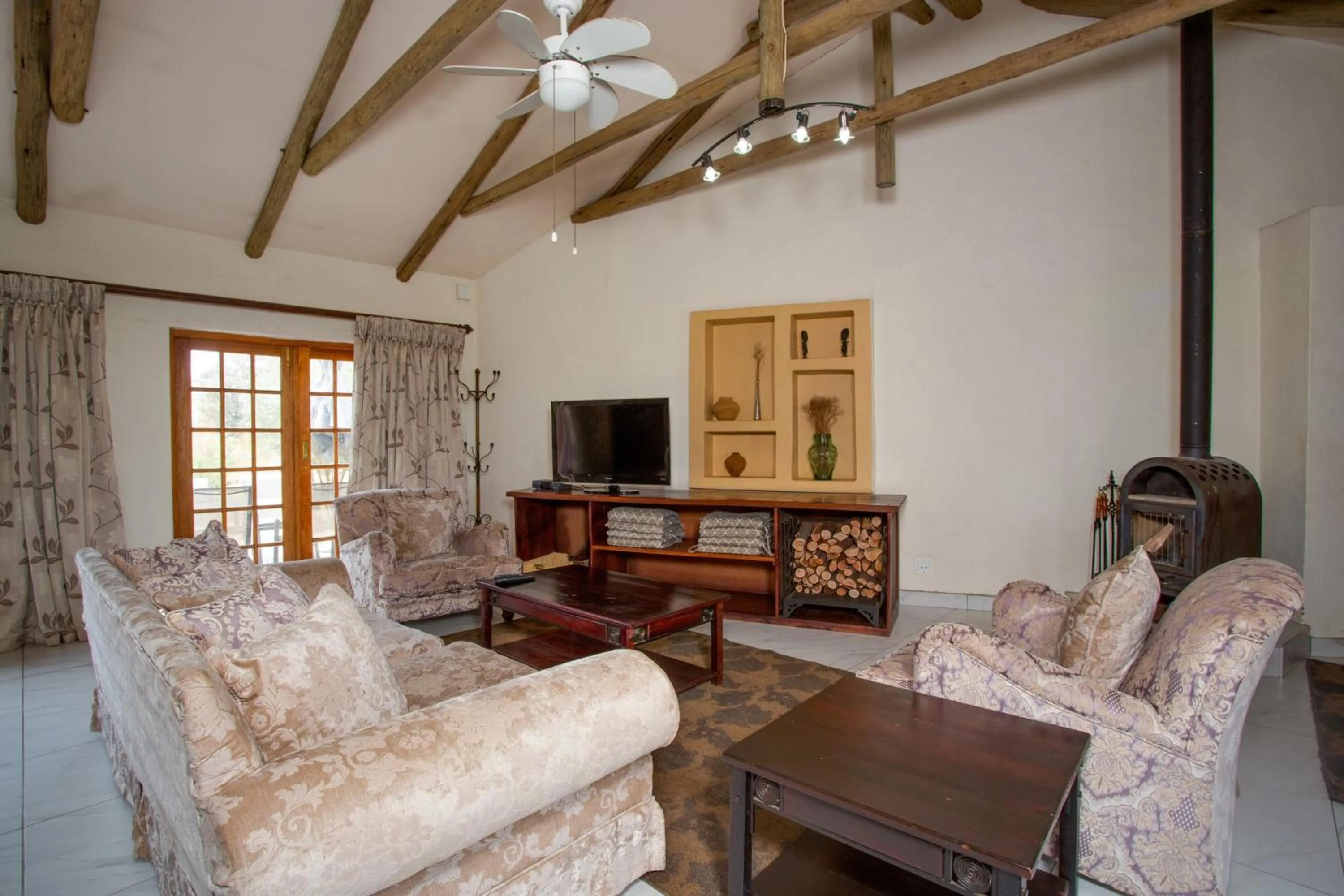 Living room in Whispering Pines Country Estate