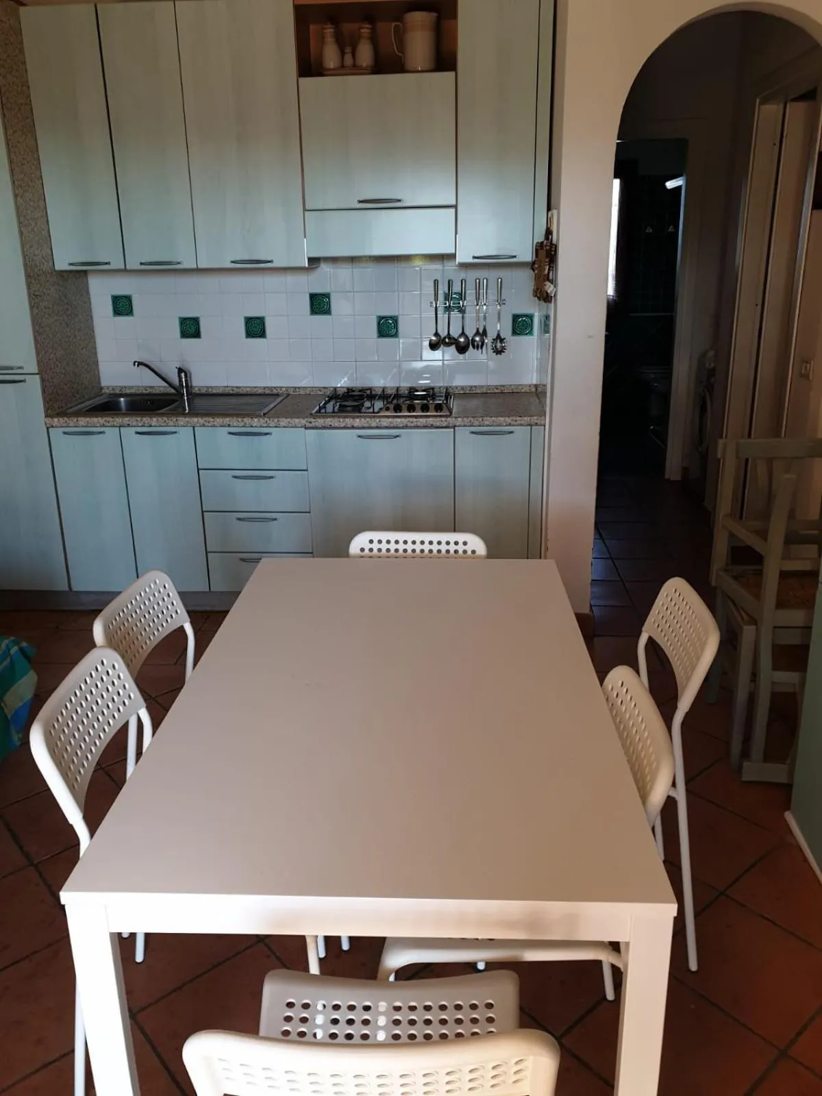 Kitchen or kitchenette in Cala Delfino