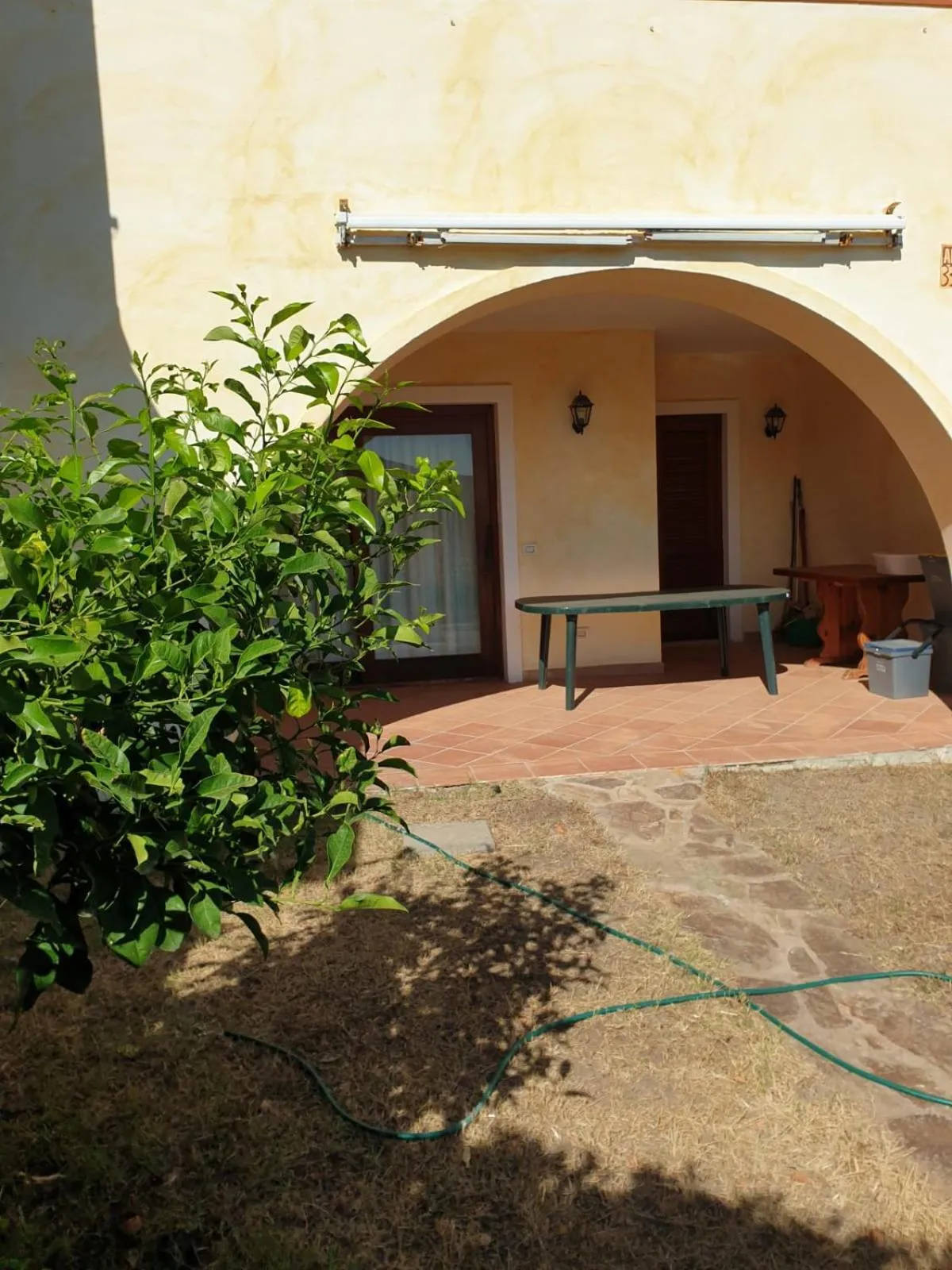 Facade/entrance in Cala Delfino
