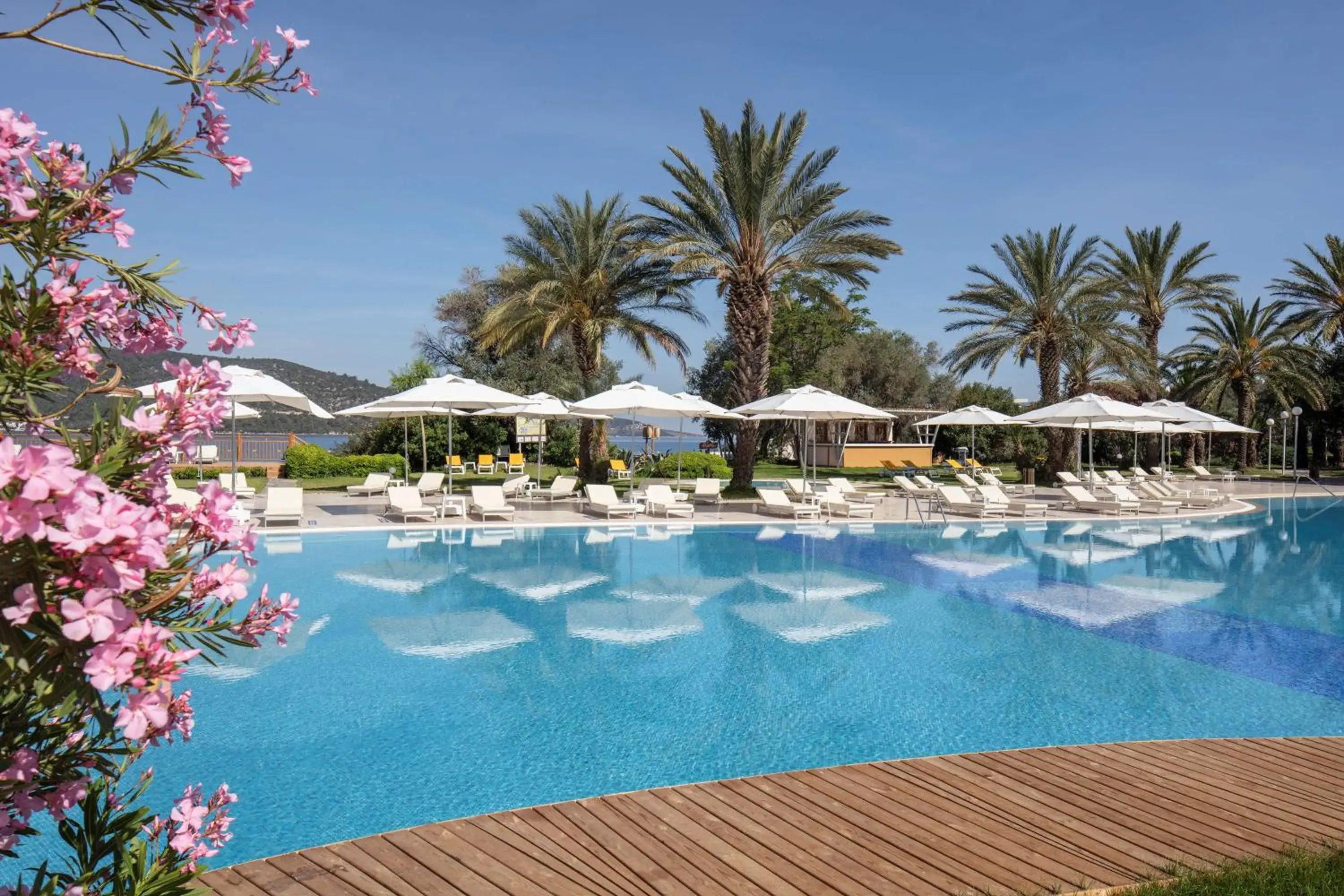 Pool view in DoubleTree by Hilton Bodrum Isil Club Ultra All-Inclusive Resort Pool view in DoubleTree by Hilton Bodrum Isil Club Ultra All-Inclusive Resort