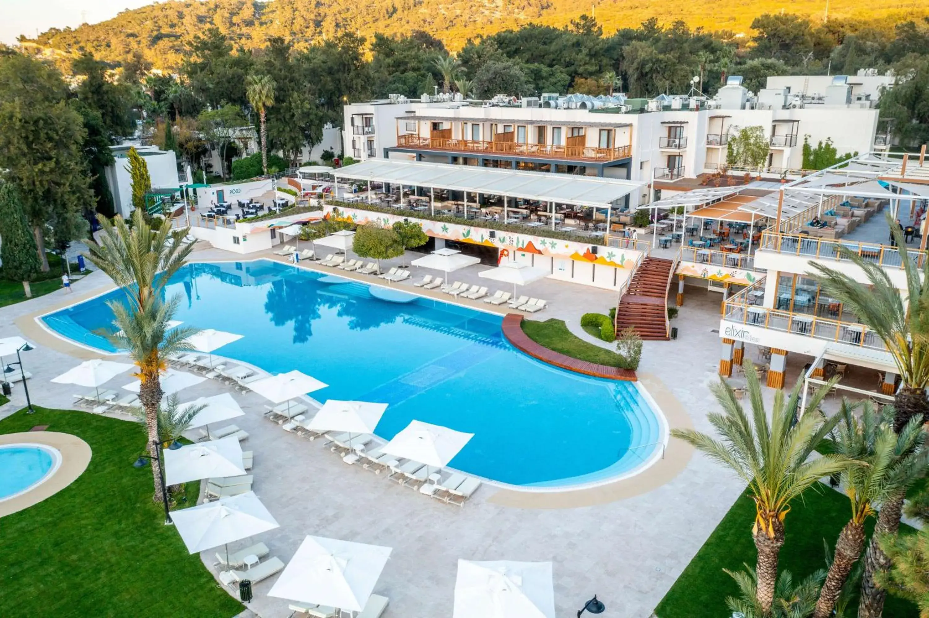Pool view in DoubleTree by Hilton Bodrum Isil Club Ultra All-Inclusive Resort Pool view in DoubleTree by Hilton Bodrum Isil Club Ultra All-Inclusive Resort