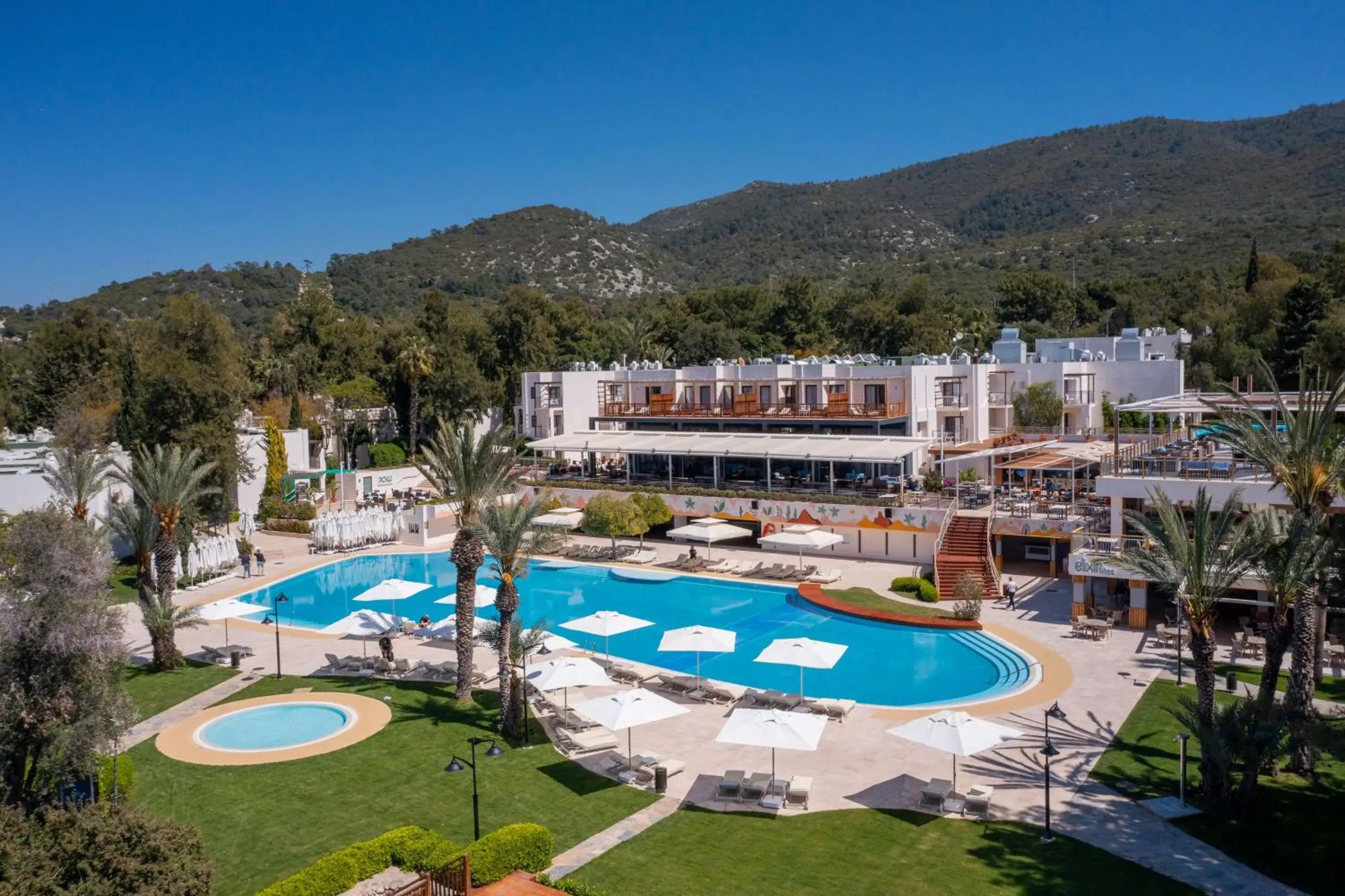 Pool view in DoubleTree by Hilton Bodrum Isil Club Ultra All-Inclusive Resort Pool view in DoubleTree by Hilton Bodrum Isil Club Ultra All-Inclusive Resort