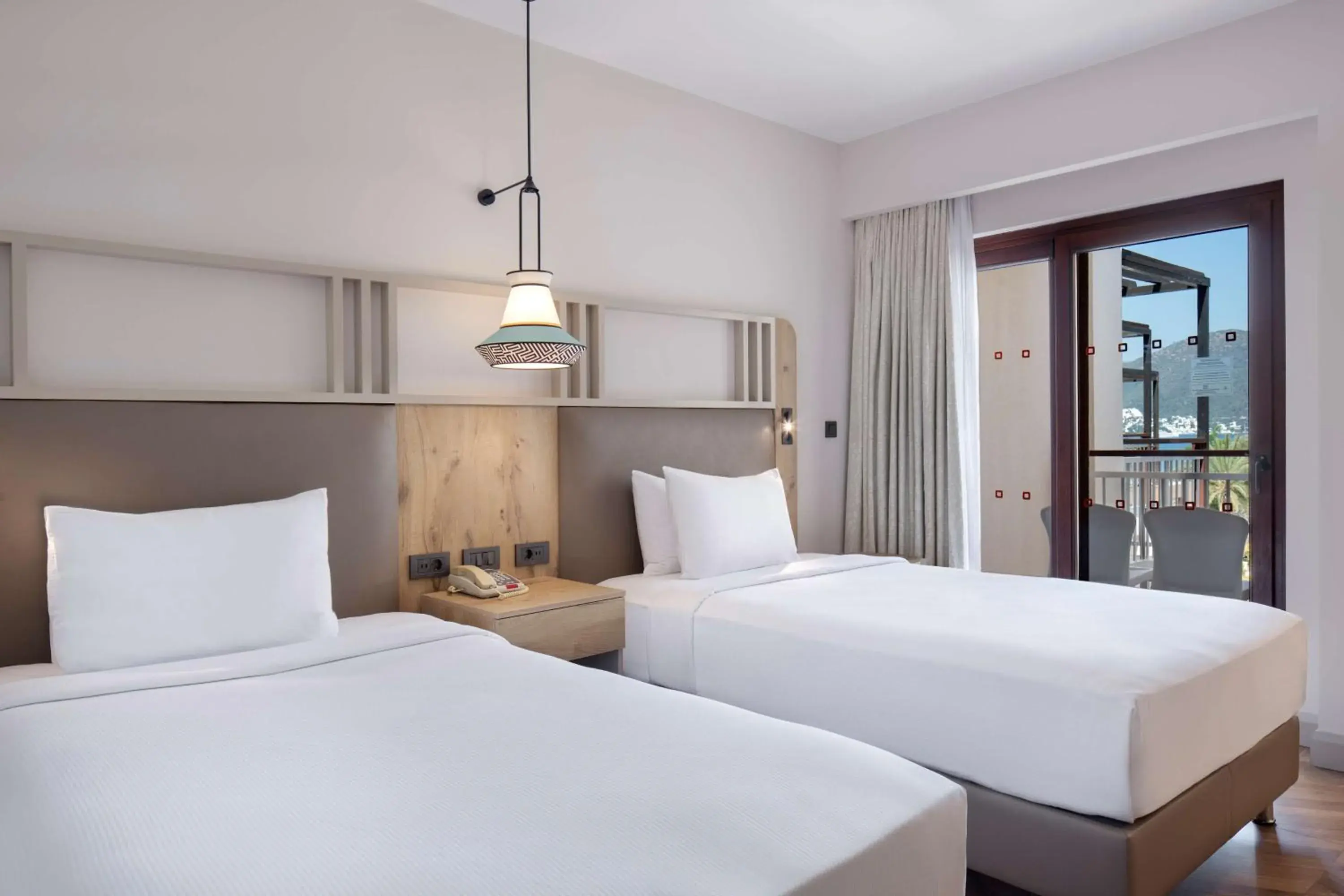 Bed in DoubleTree by Hilton Bodrum Isil Club Ultra All-Inclusive Resort Bed in DoubleTree by Hilton Bodrum Isil Club Ultra All-Inclusive Resort