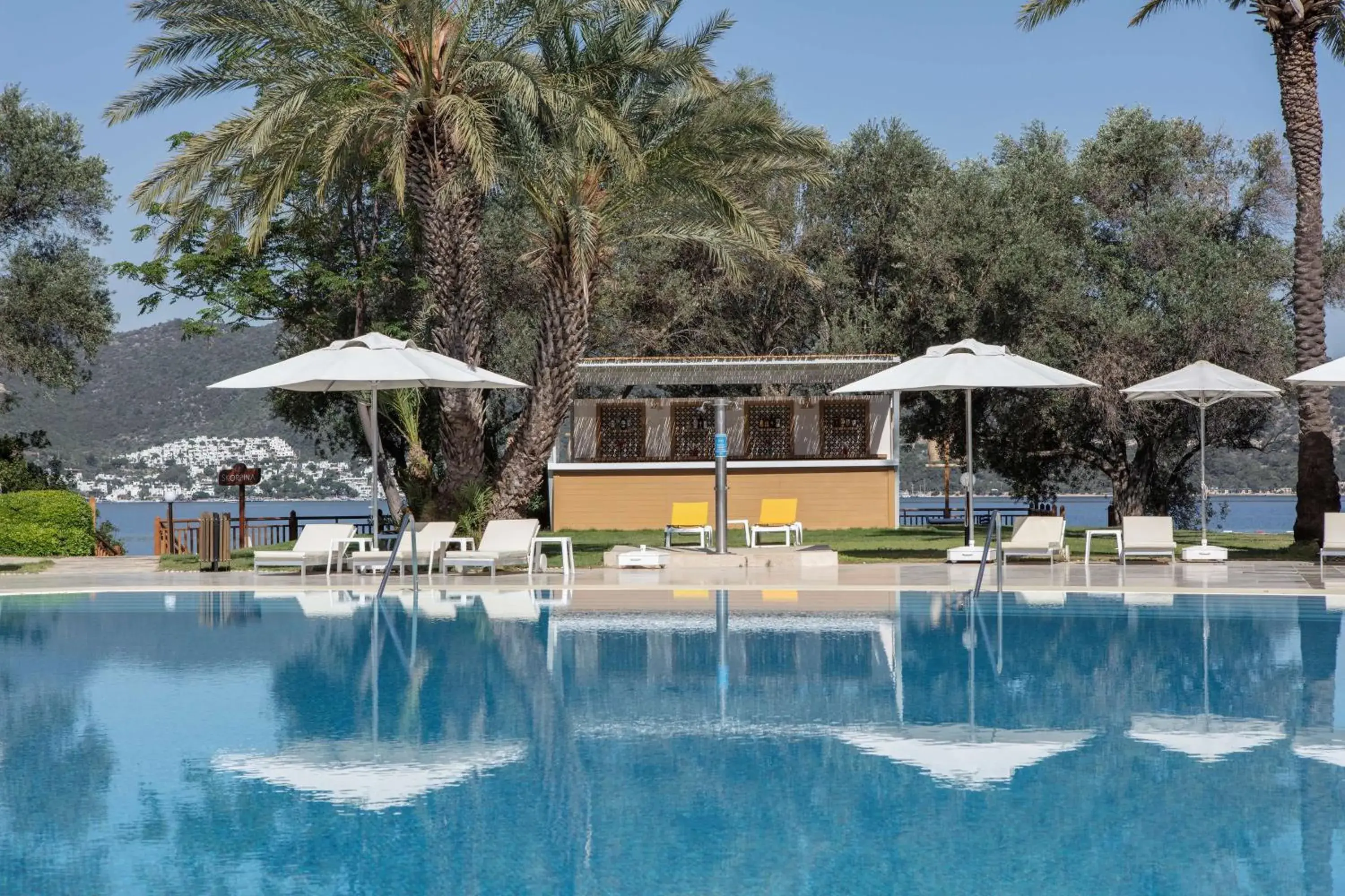 Pool view in DoubleTree by Hilton Bodrum Isil Club Ultra All-Inclusive Resort Pool view in DoubleTree by Hilton Bodrum Isil Club Ultra All-Inclusive Resort