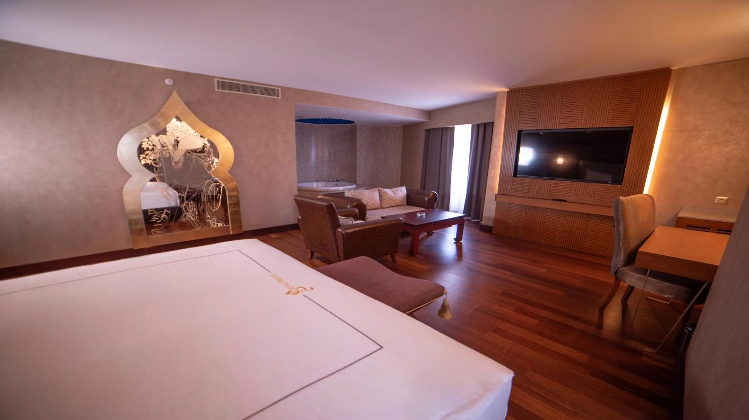 Bed in Royal Dragon Hotel