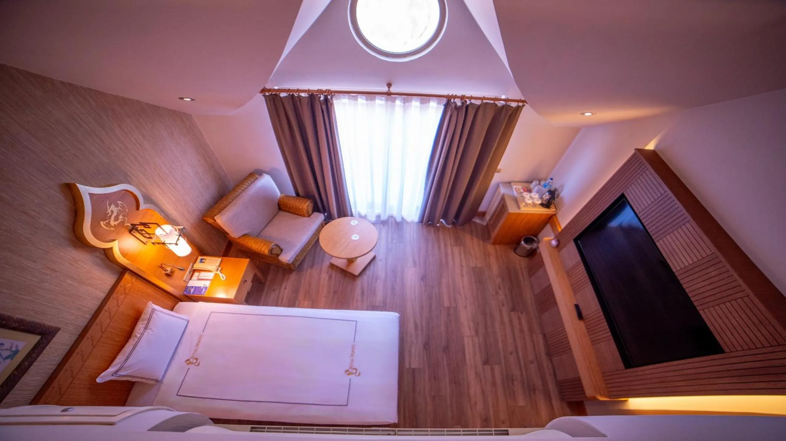 Bedroom, Bed in Royal Dragon Hotel