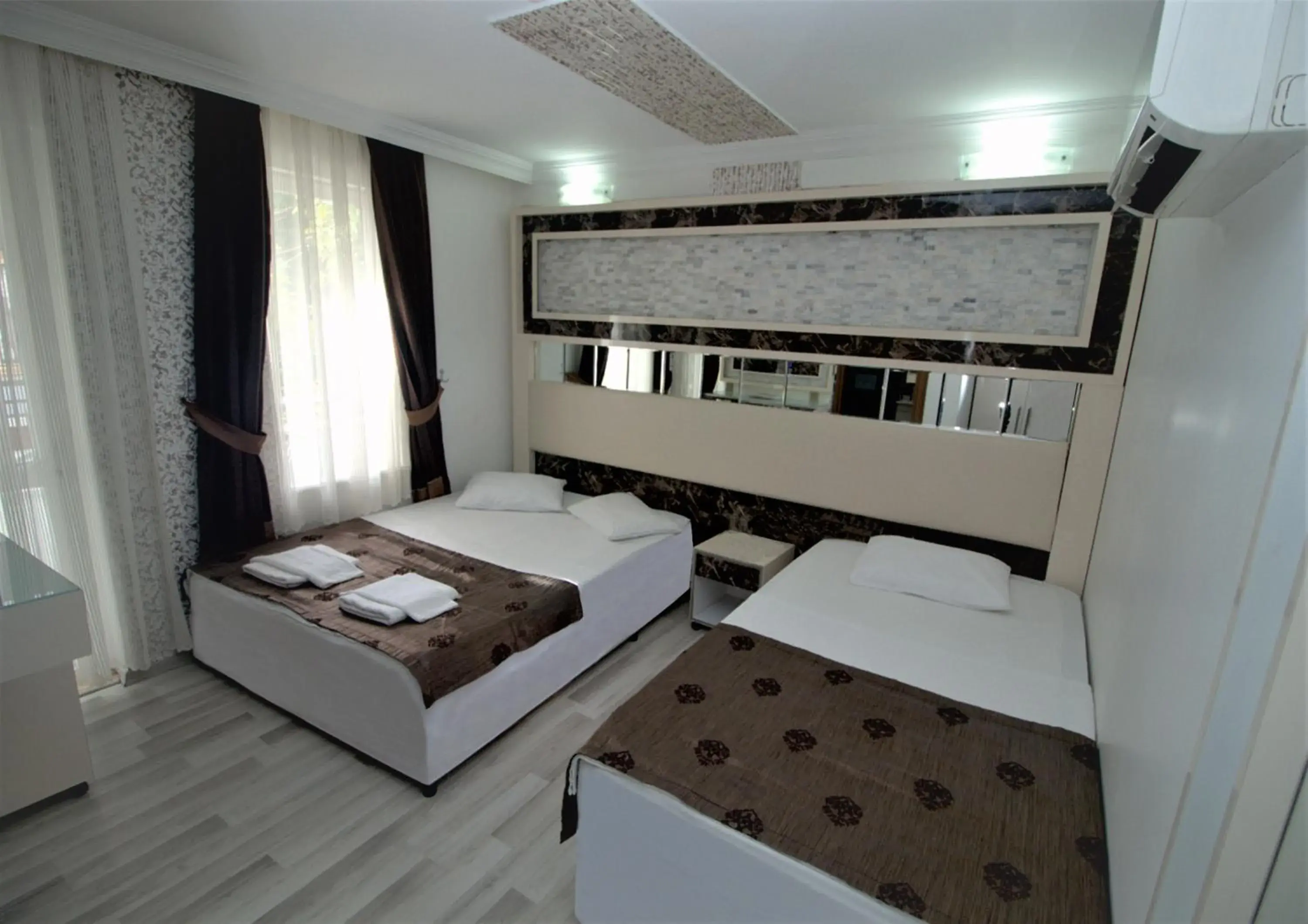 Bed in Behram Hotel