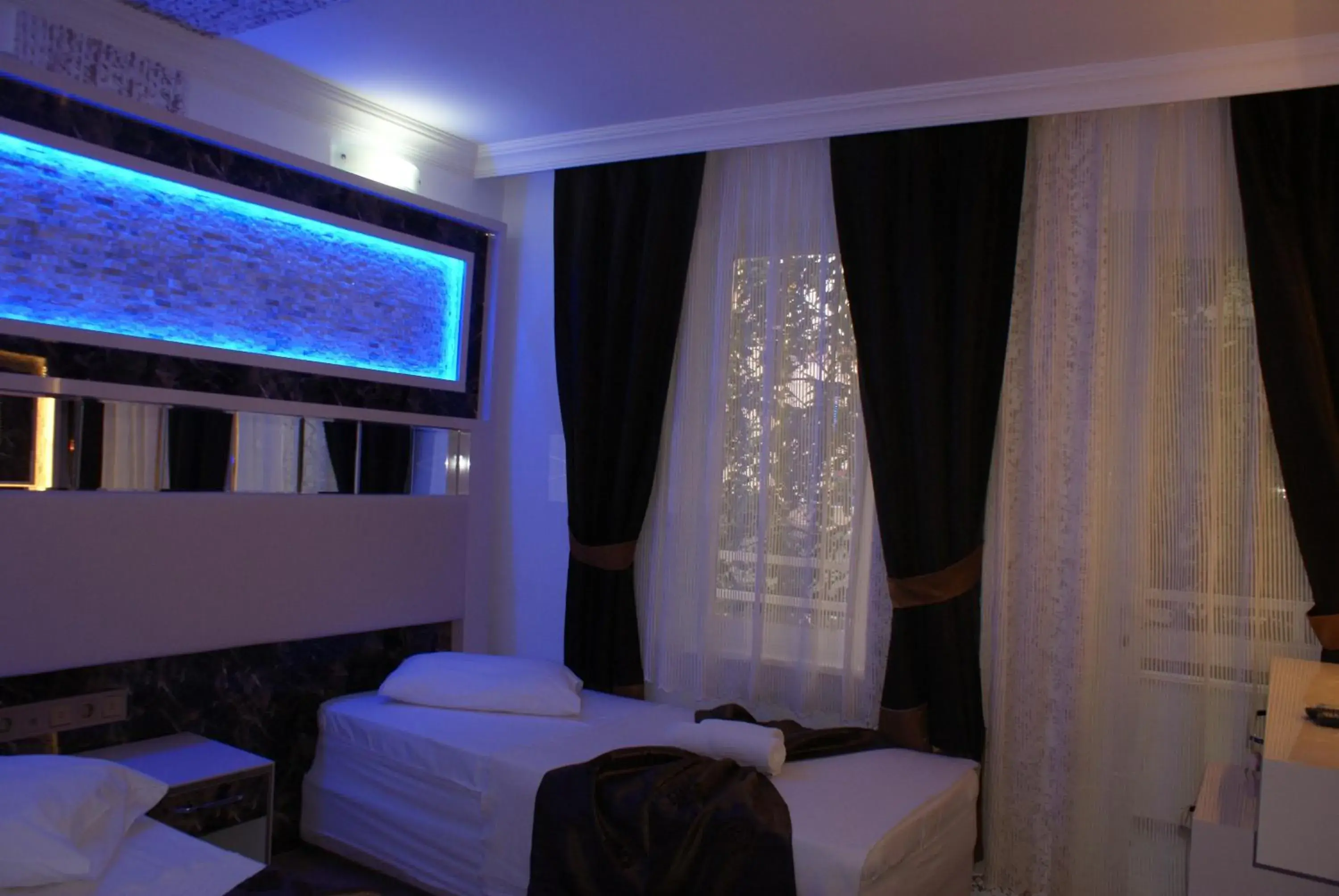 Photo of the whole room, Bed in Behram Hotel