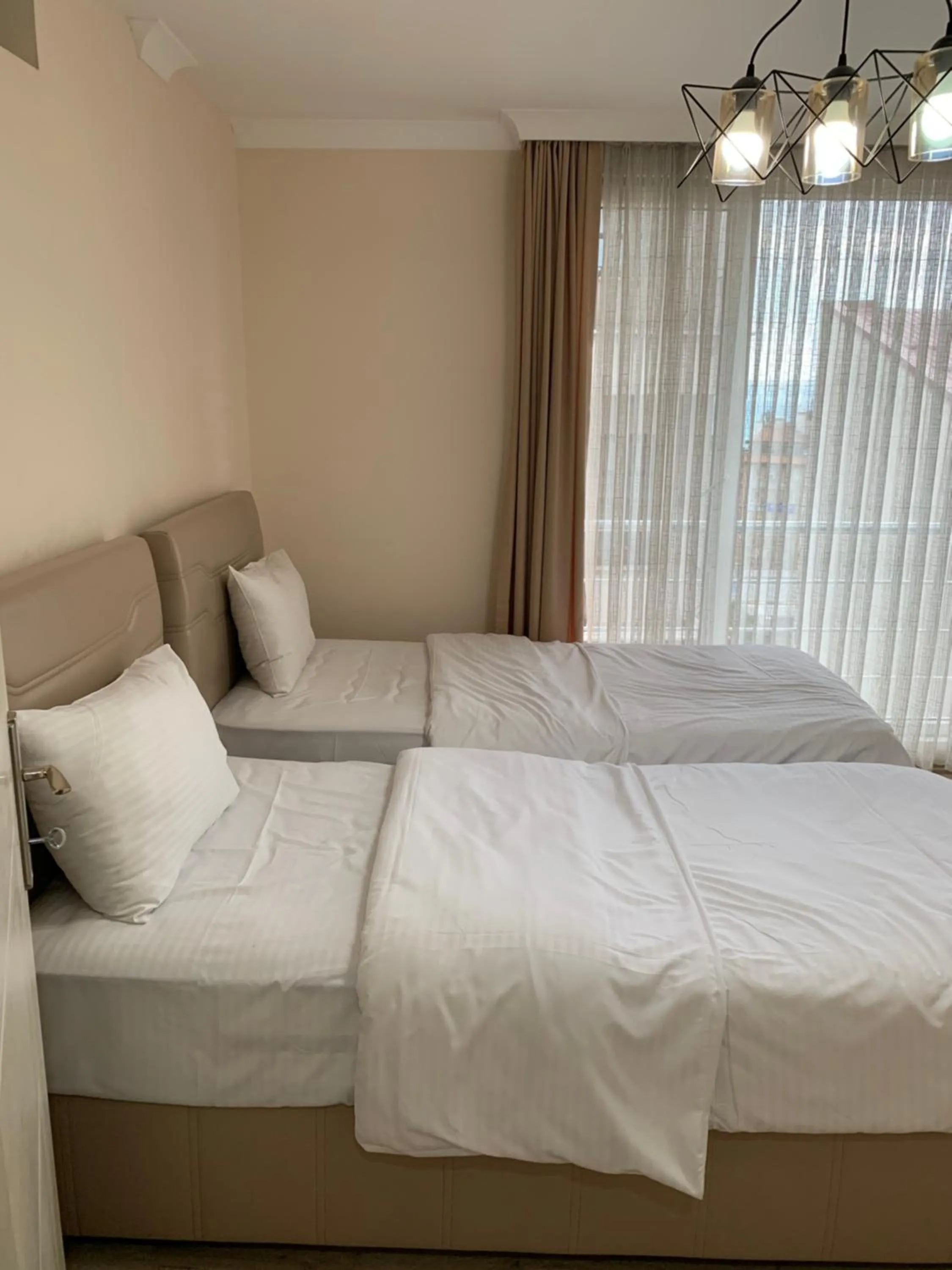 Bed in Esa Apart Hotel