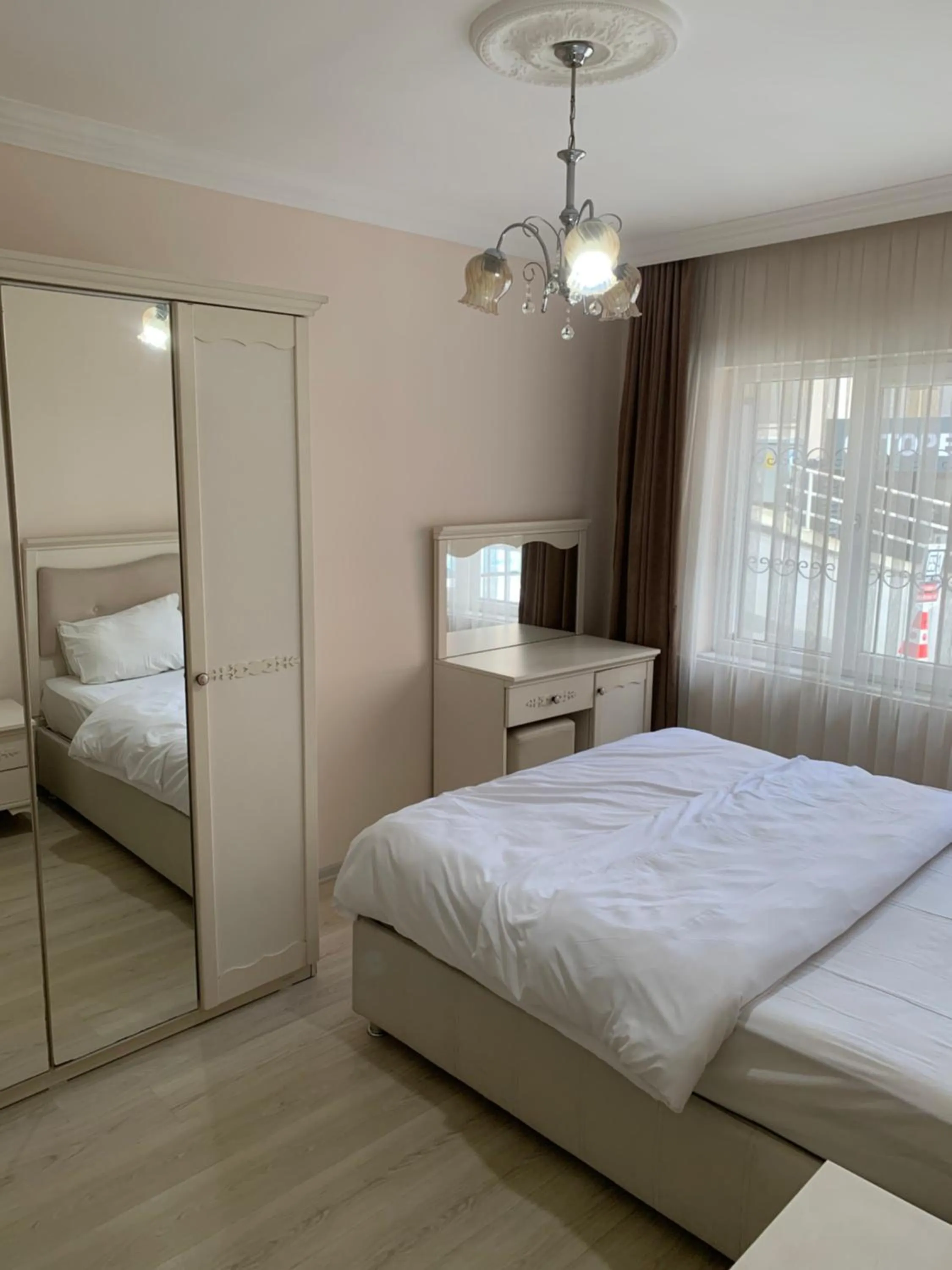 Bed in Esa Apart Hotel