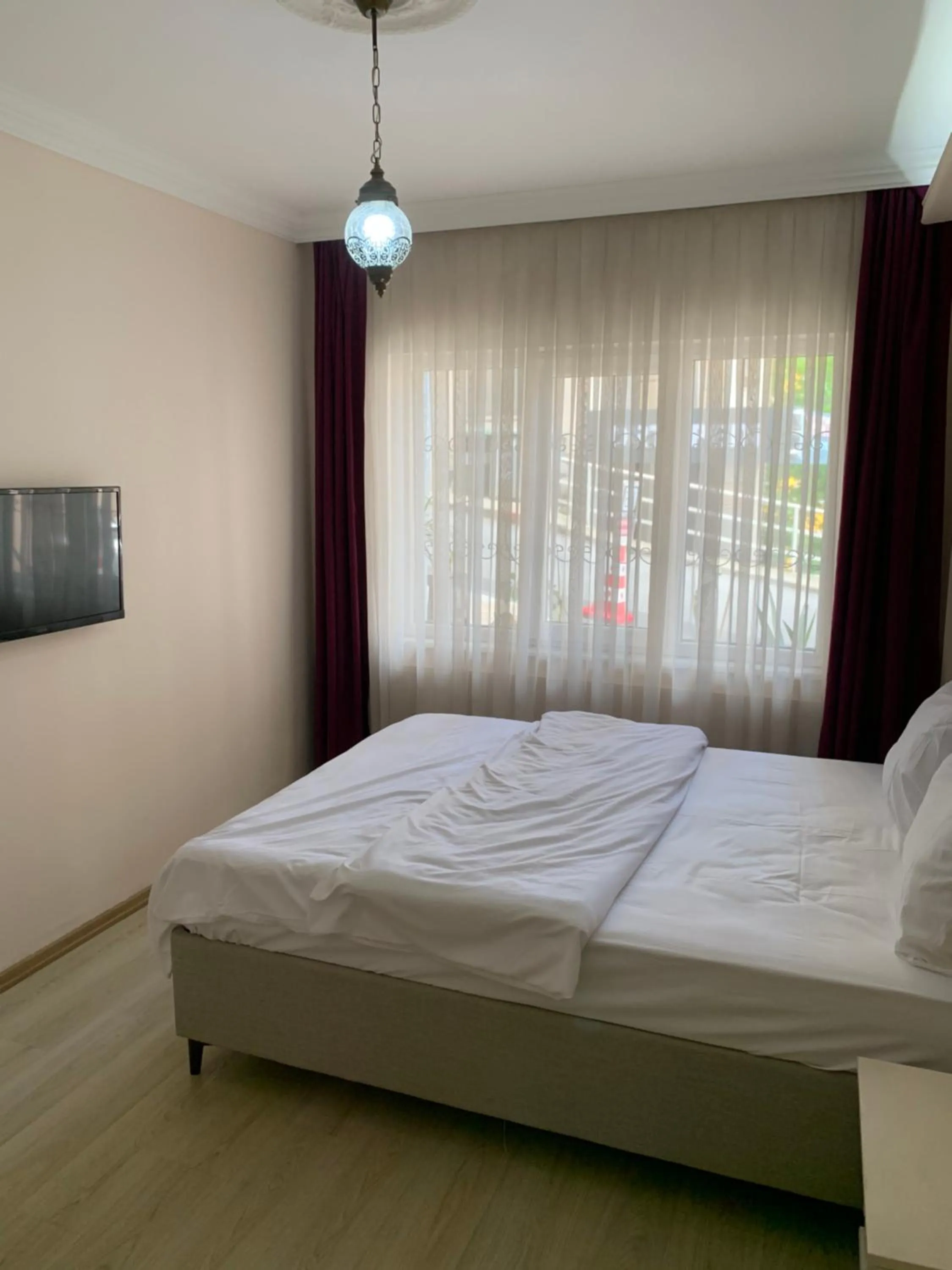 Bed in Esa Apart Hotel