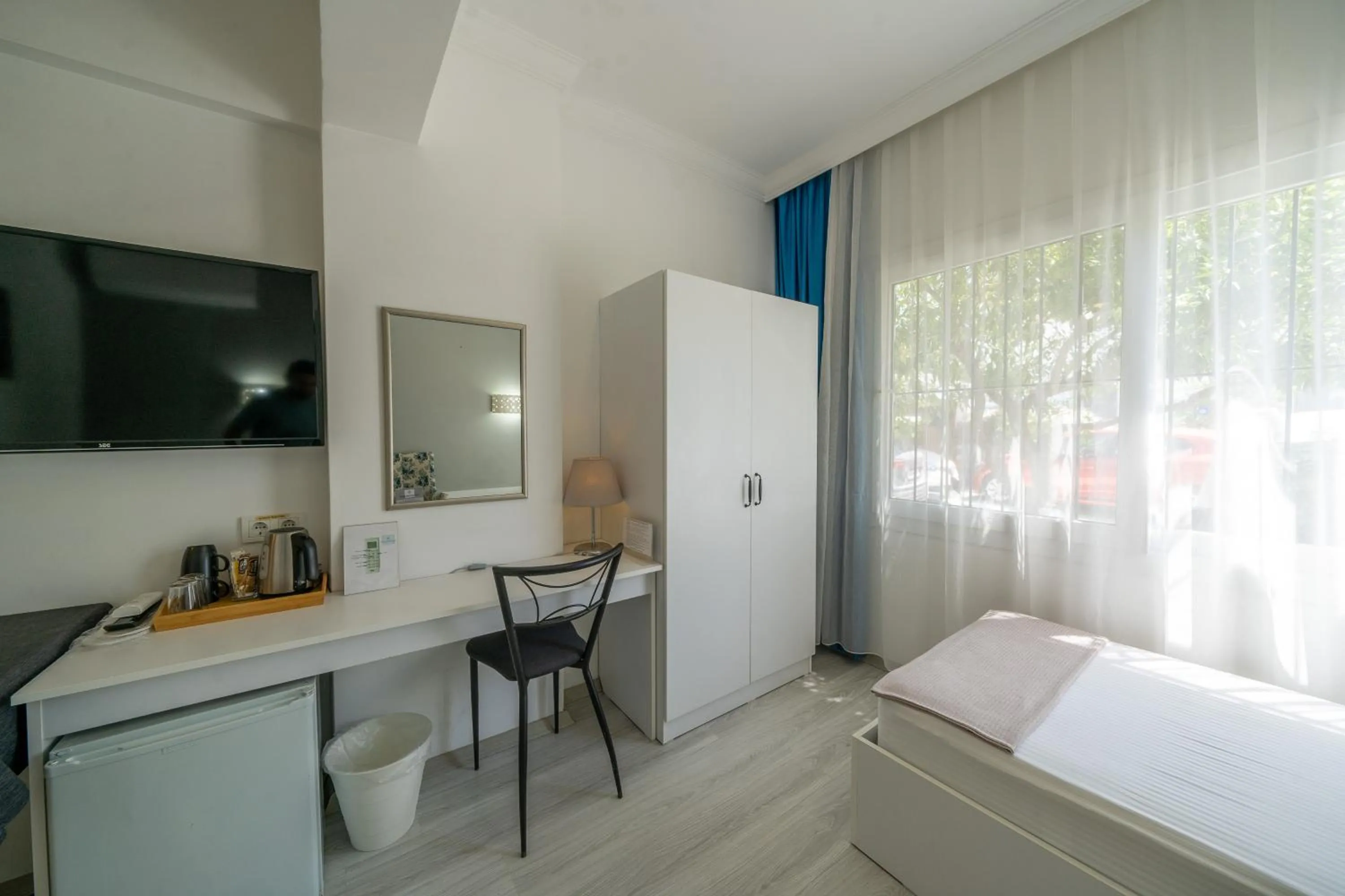 TV and multimedia, Bed in Artunc Hotel Bodrum