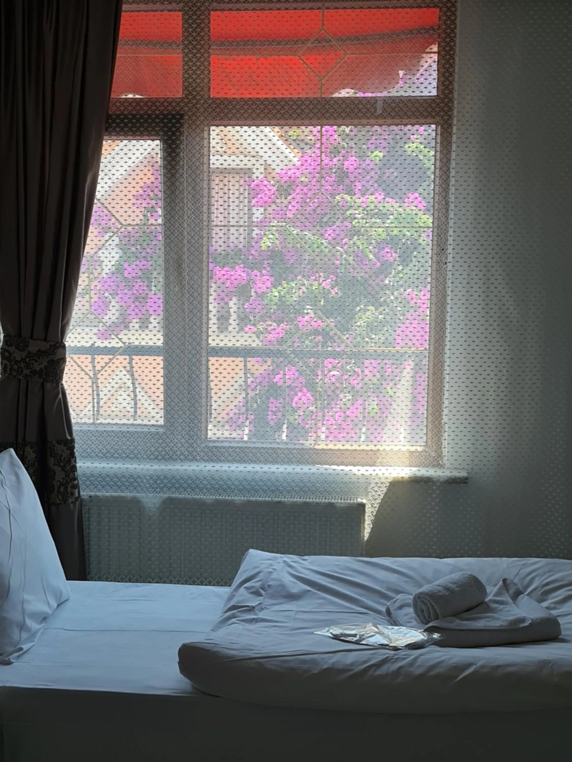 Bed in Oceans 7 Hotel