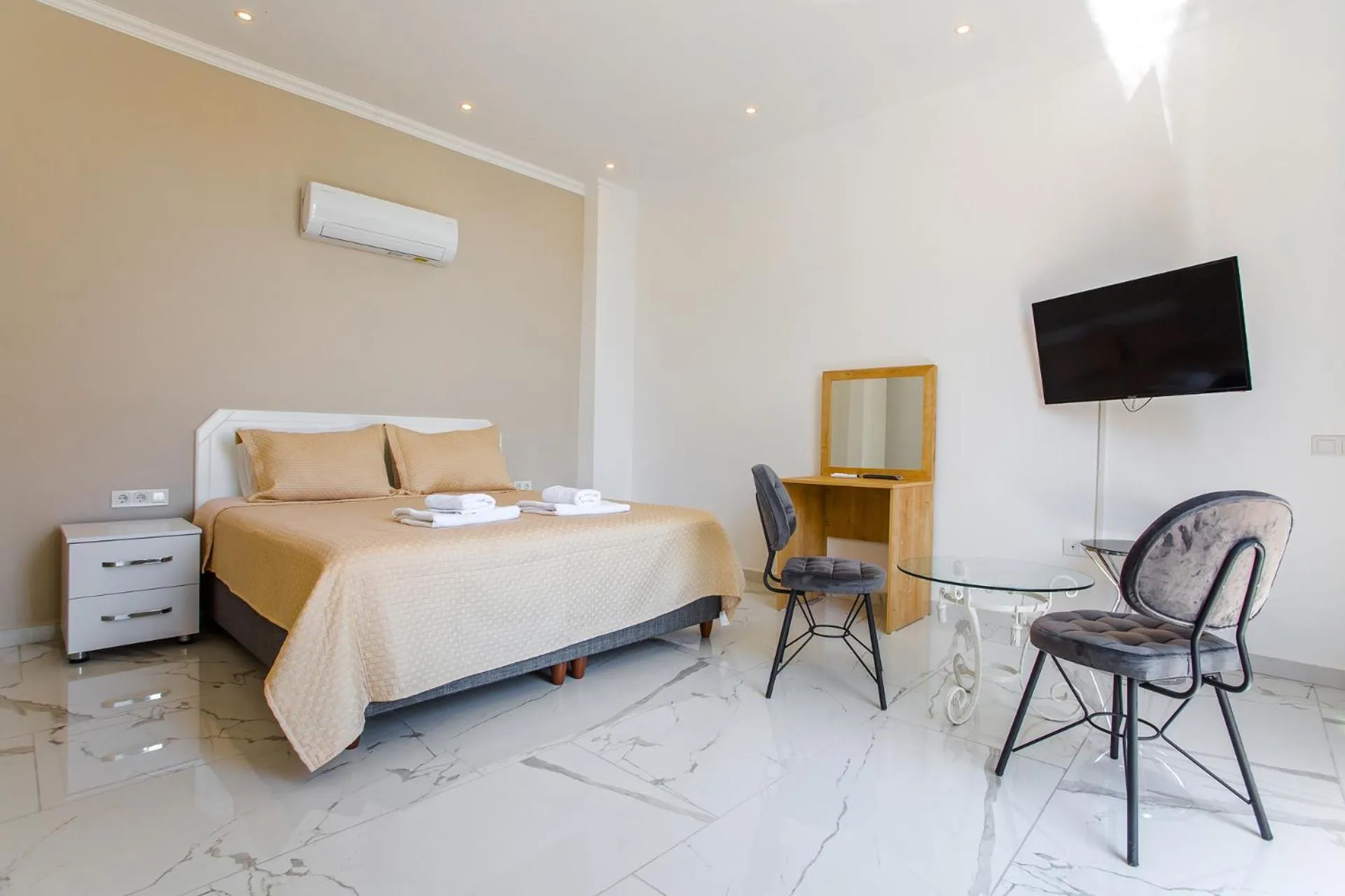 Bed in Nur Suites & Hotels