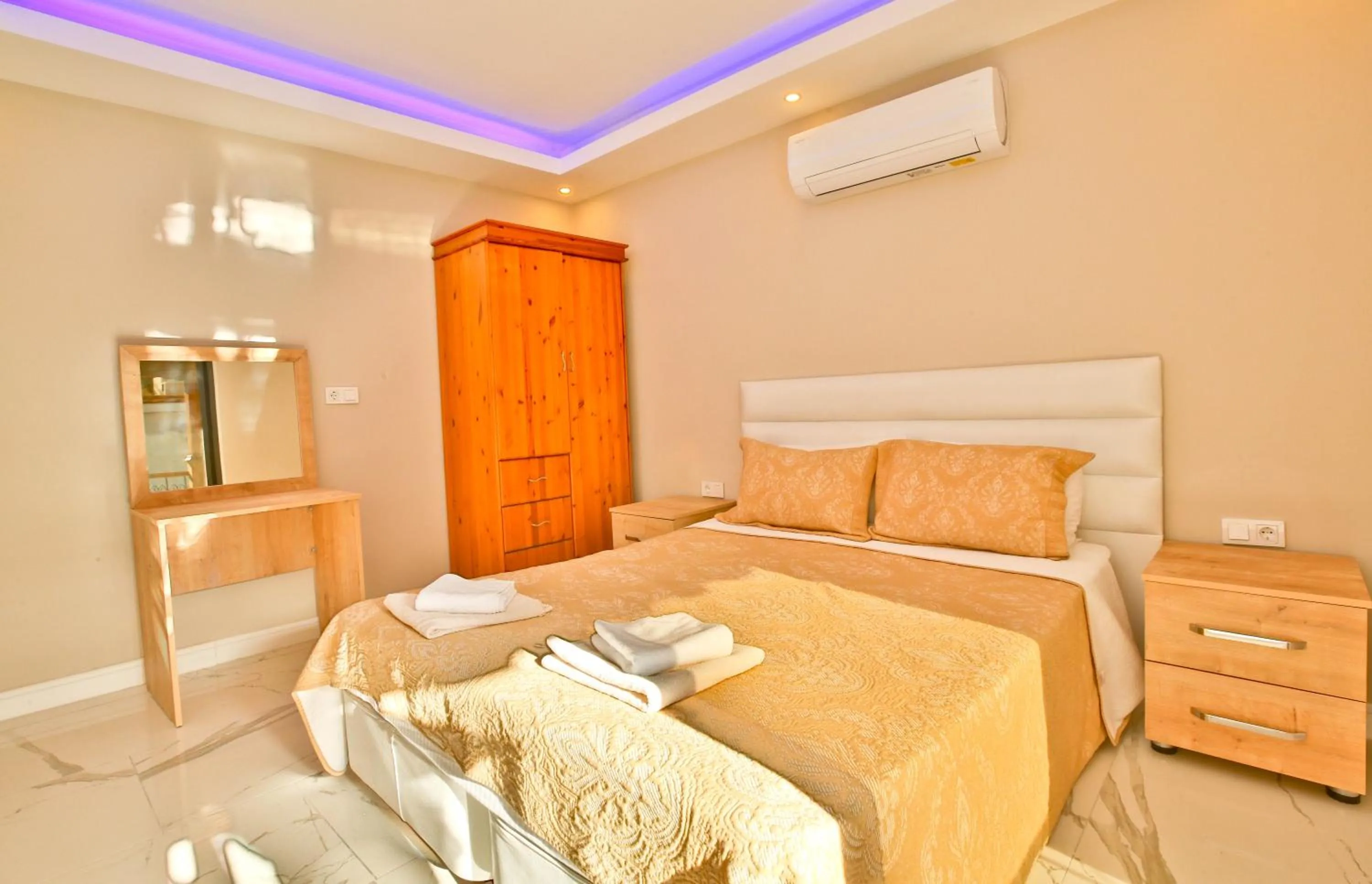 Bed in Nur Suites & Hotels