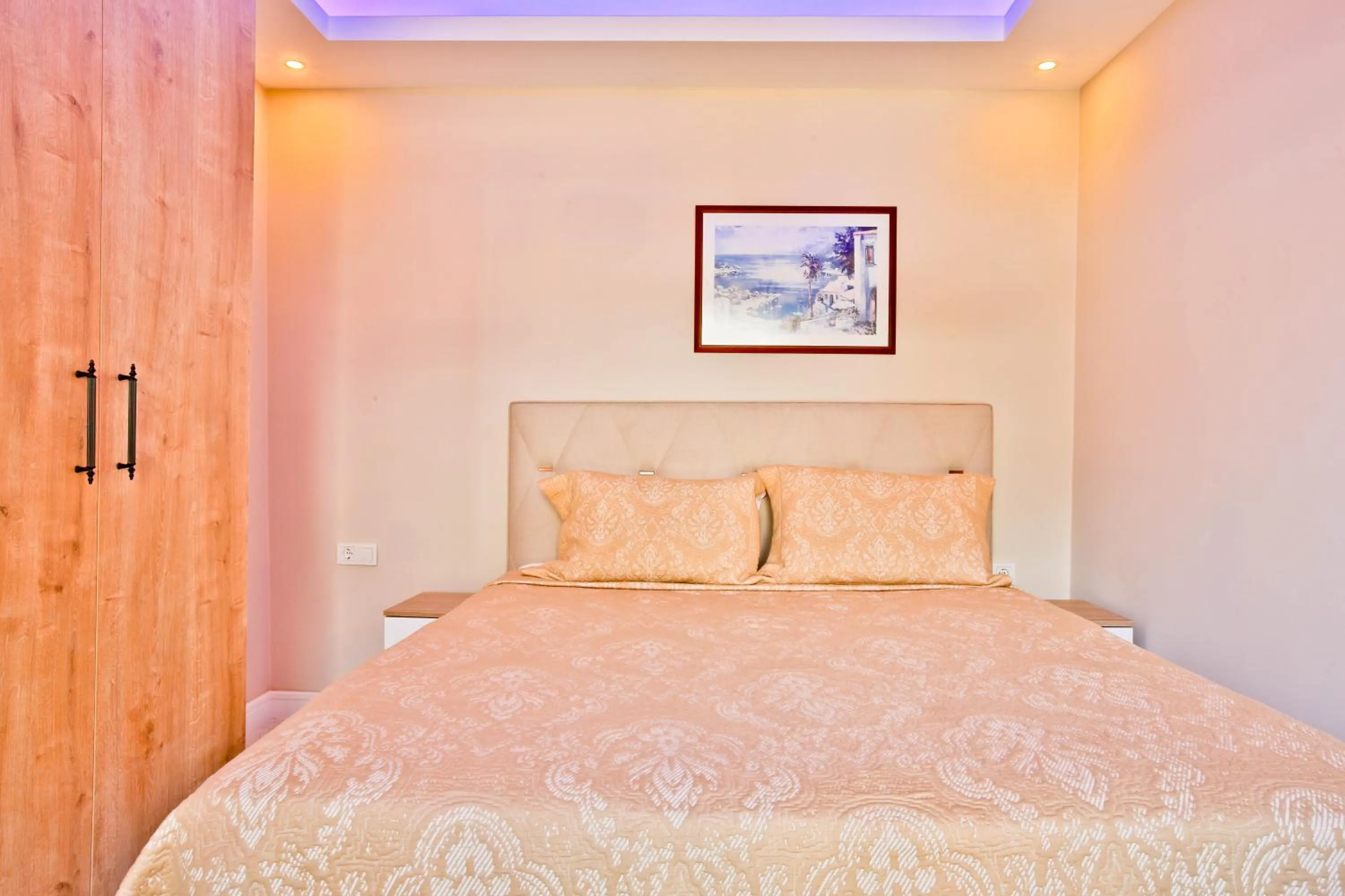 Bed in Nur Suites & Hotels